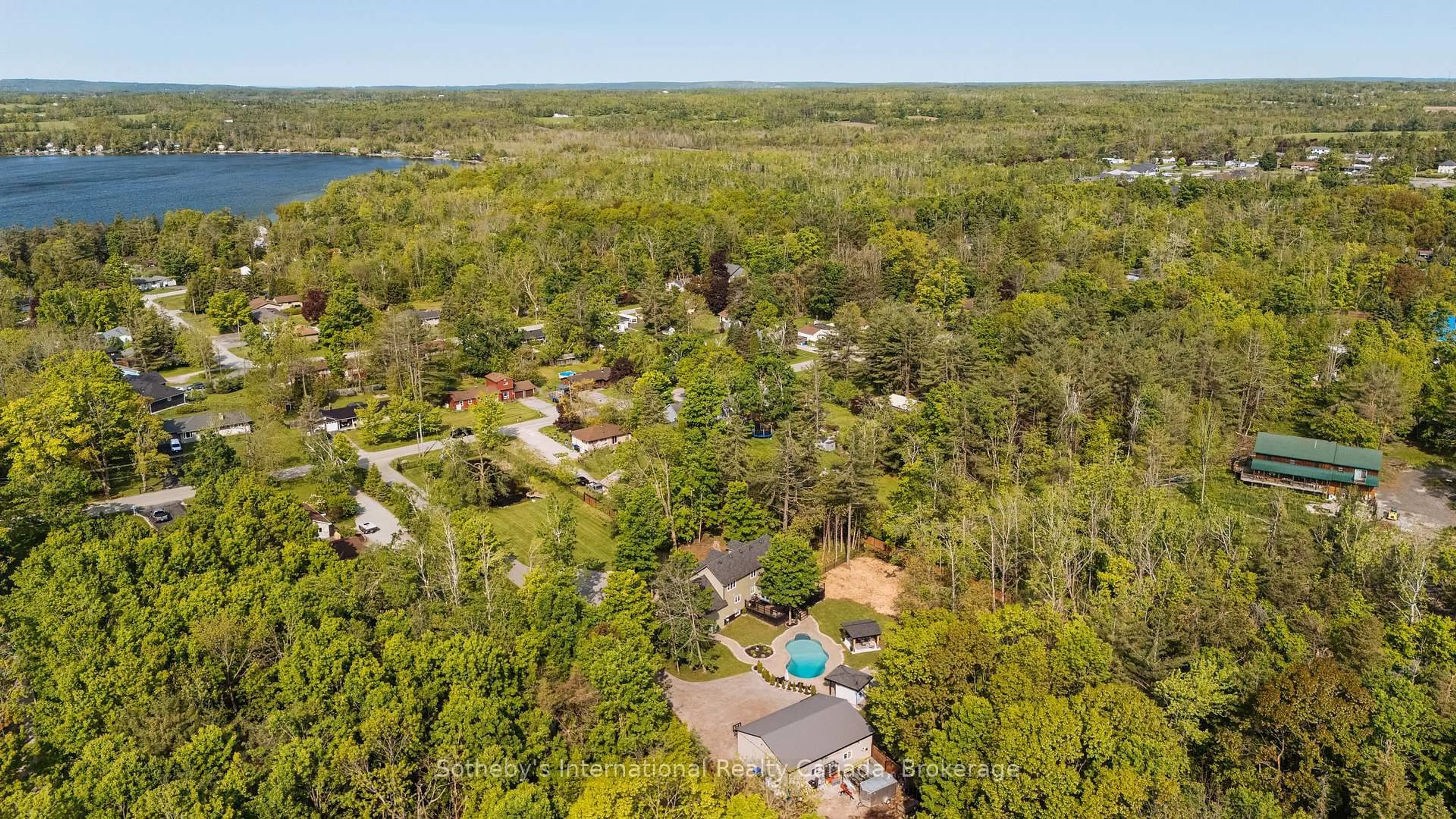 A pic from outside/outdoor area/front of a property/back of a property/a pic from drone, water/lake/river/ocean view for 129 Bass Line, Oro-Medonte Ontario L3V 0J9