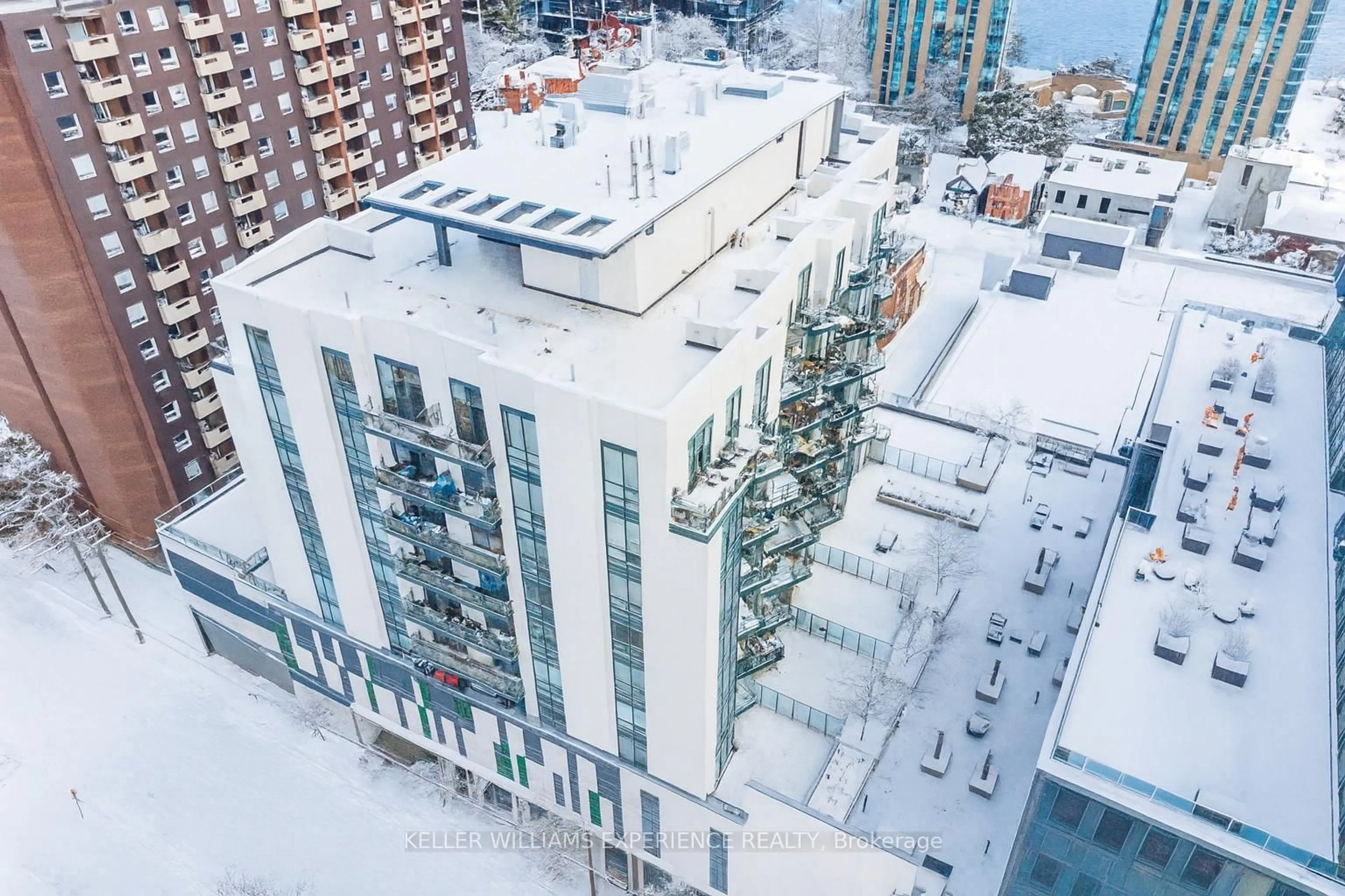 A pic from outside/outdoor area/front of a property/back of a property/a pic from drone, city buildings view from balcony for 111 Worsley St #GPH1, Barrie Ontario L4M 0J5