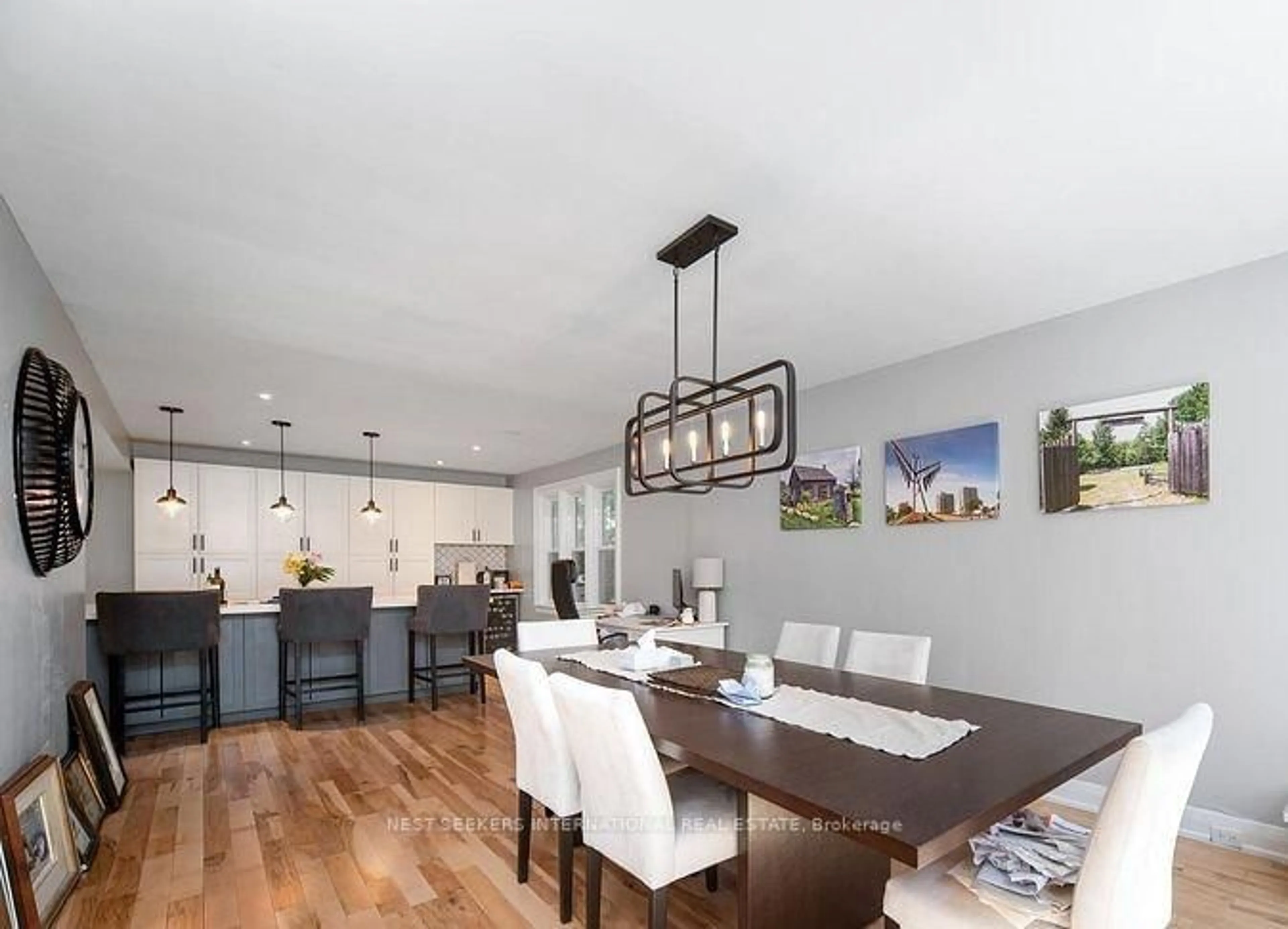 Open concept kitchen, wood/laminate floor for 98 Blake St, Barrie Ontario L4M 1J9