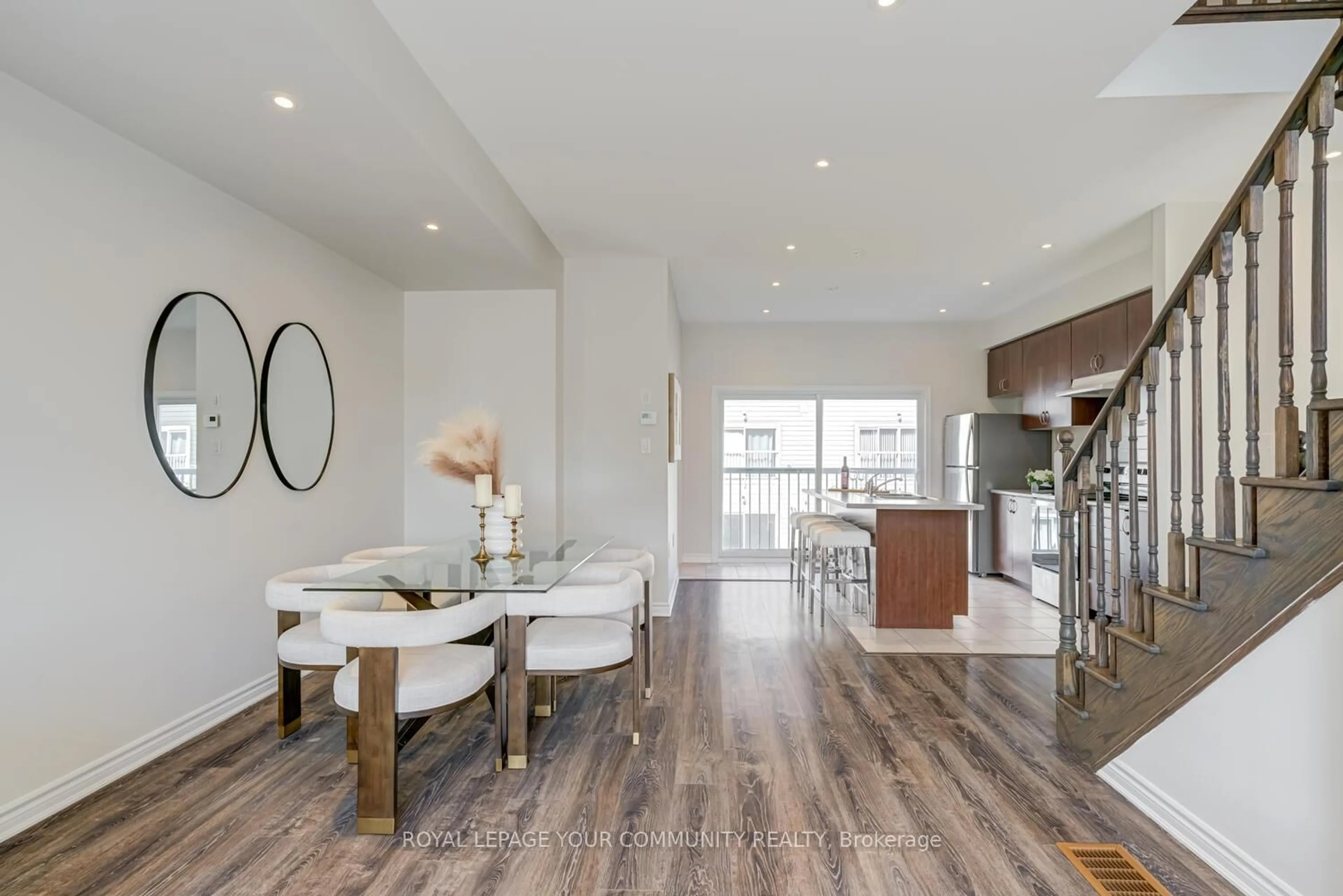 Open concept kitchen, wood/laminate floor for 25 Shelburne Ave, Wasaga Beach Ontario L9Z 2X2