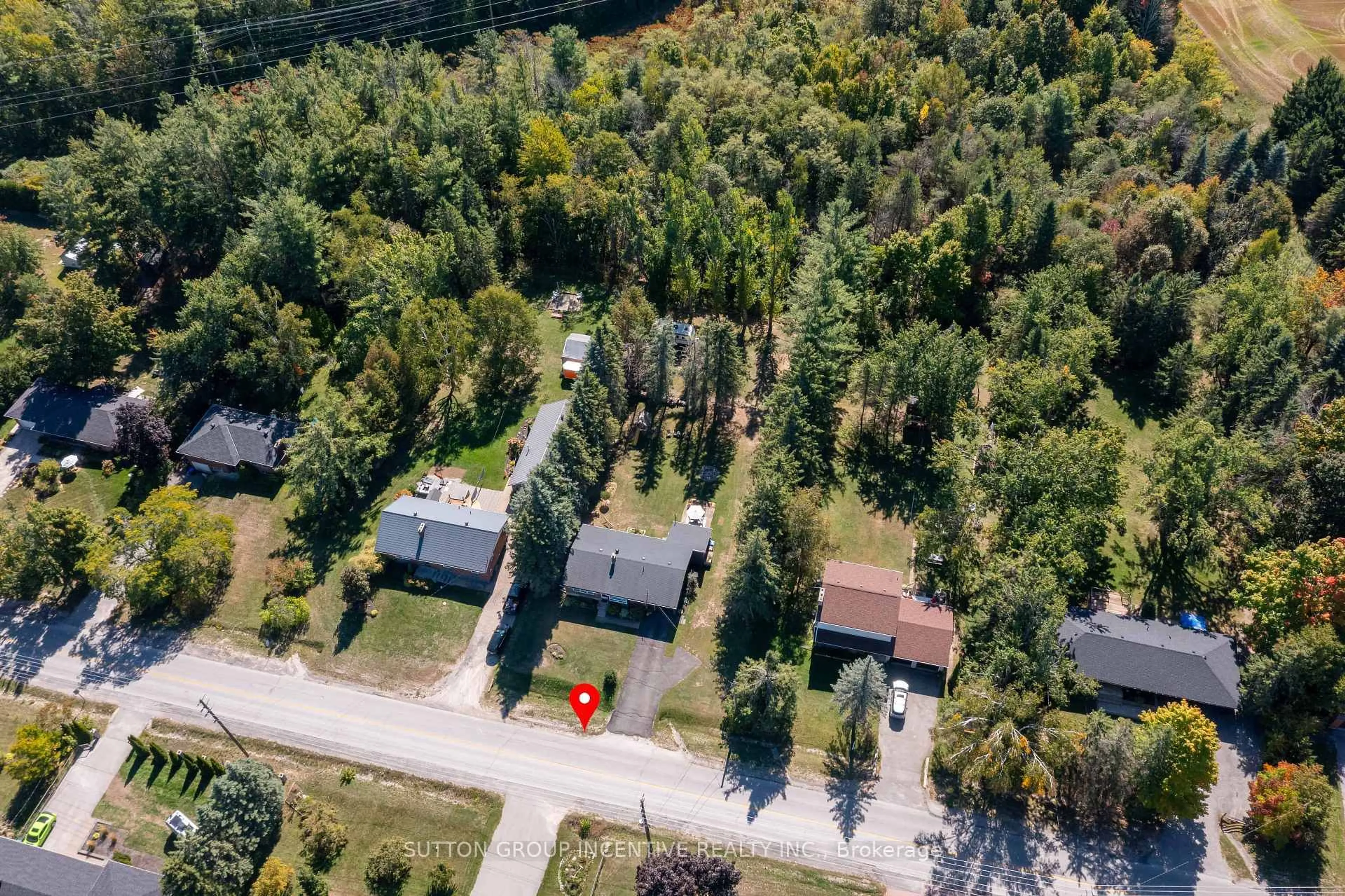 A pic from outside/outdoor area/front of a property/back of a property/a pic from drone, street for 1171 Carson Rd, Springwater Ontario L4M 4S5