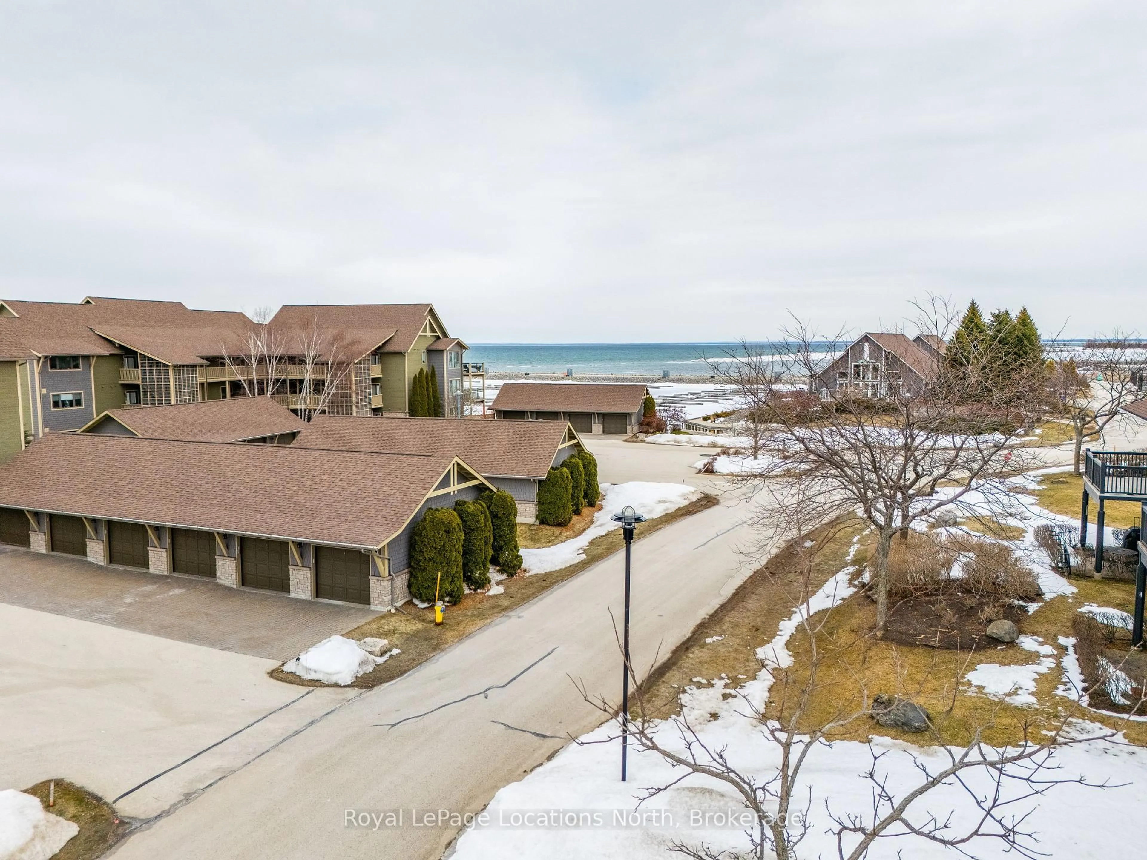 A pic from outside/outdoor area/front of a property/back of a property/a pic from drone, water/lake/river/ocean view for 465 Mariners Way, Collingwood Ontario L9Y 5C7