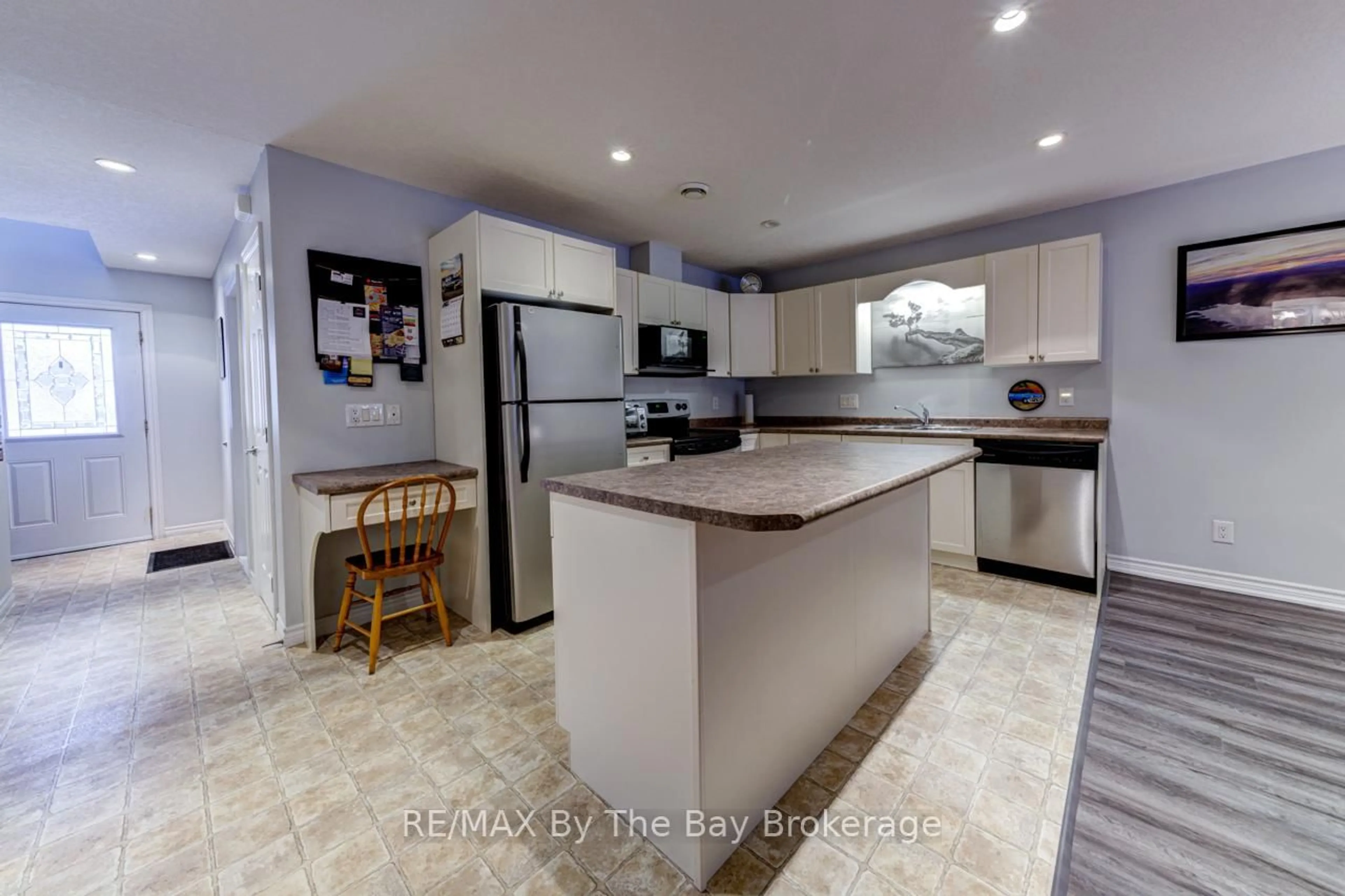 Open concept kitchen, ceramic/tile floor for 65 MEADOW Lane, Wasaga Beach Ontario L9Z 0A3