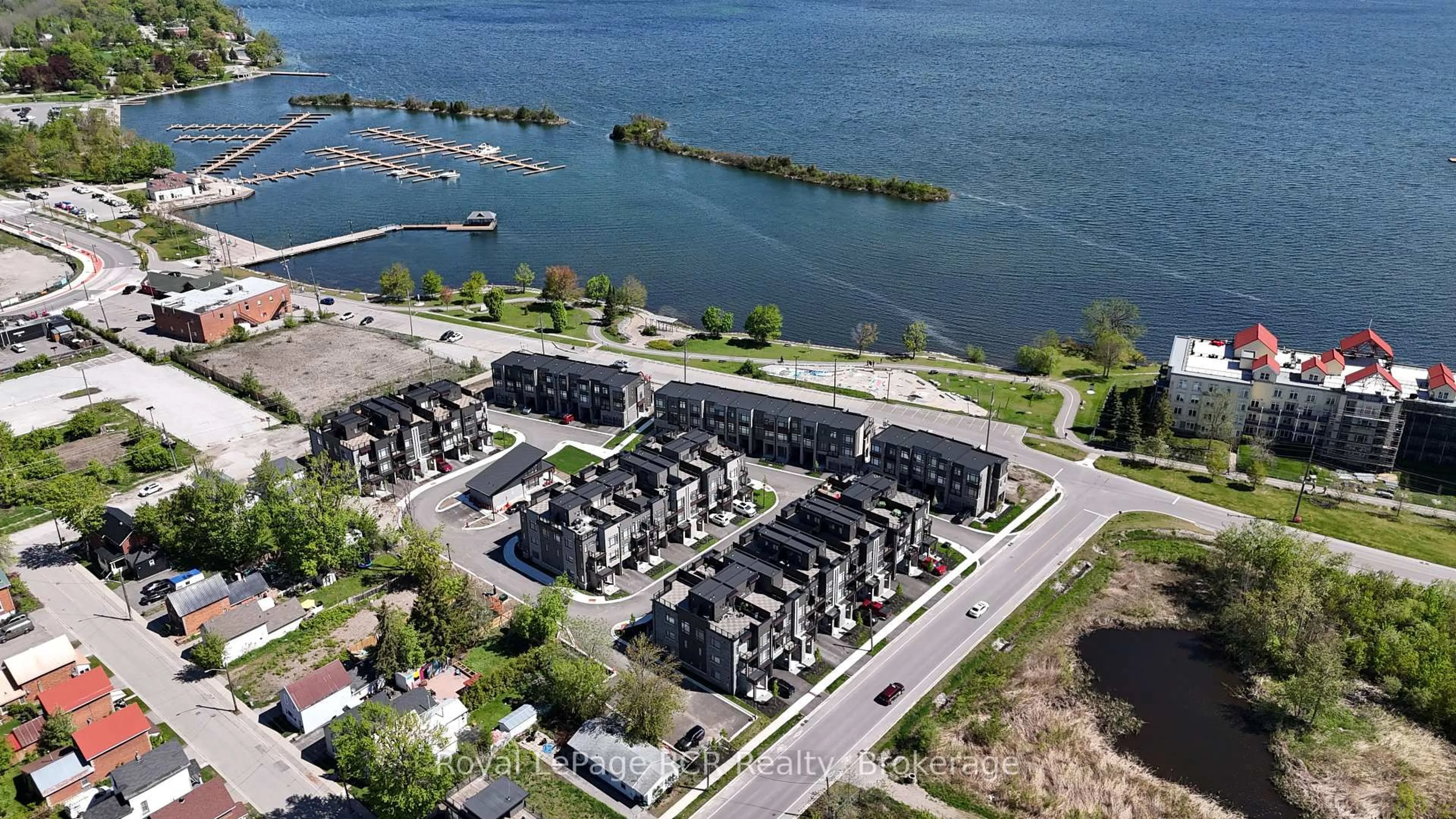 A pic from outside/outdoor area/front of a property/back of a property/a pic from drone, water/lake/river/ocean view for 150 Elgin St, Orillia Ontario L3V 8P7