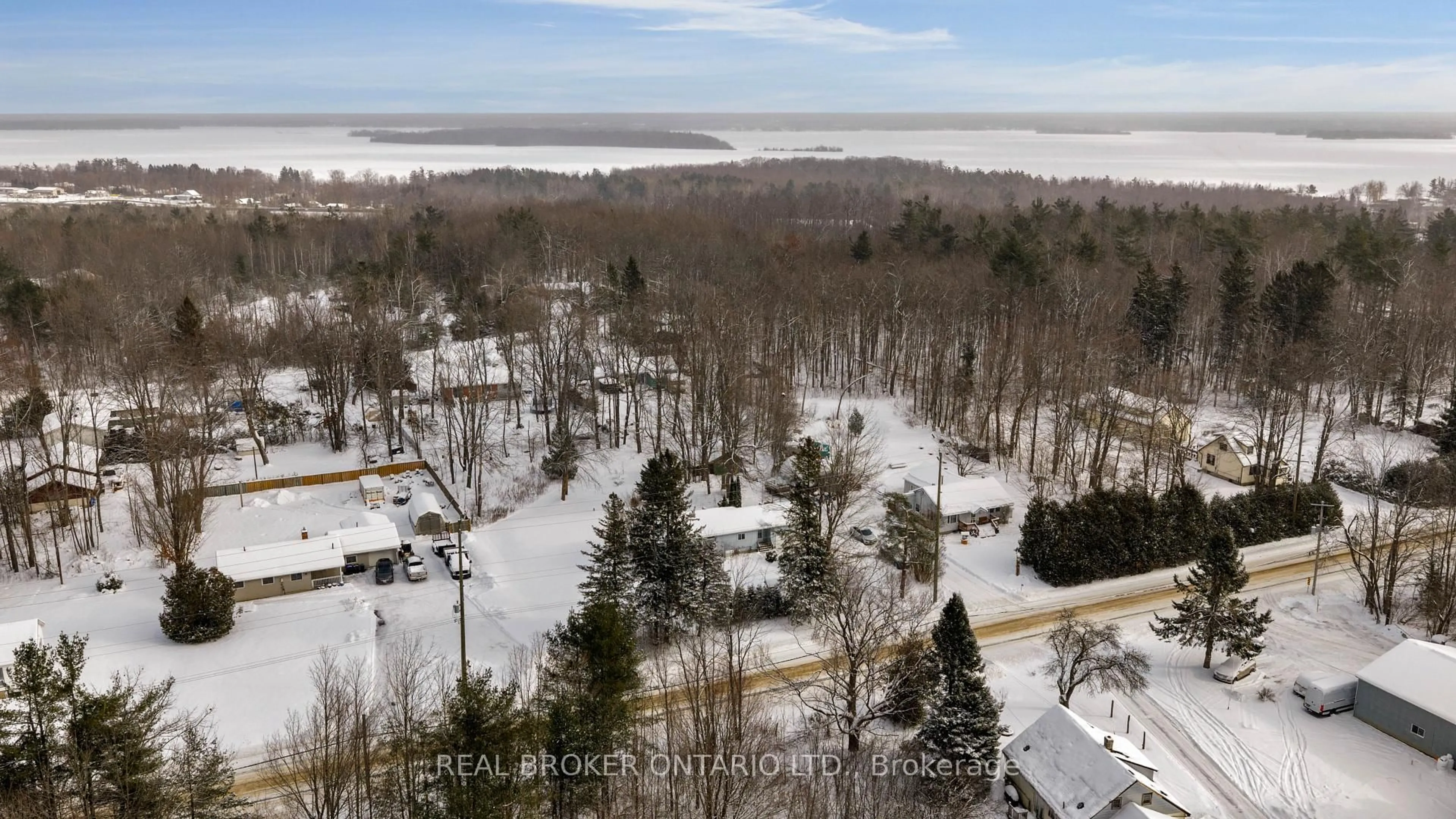 A pic from outside/outdoor area/front of a property/back of a property/a pic from drone, water/lake/river/ocean view for 4233 Carlyon Line, Orillia Ontario L3V 0W8