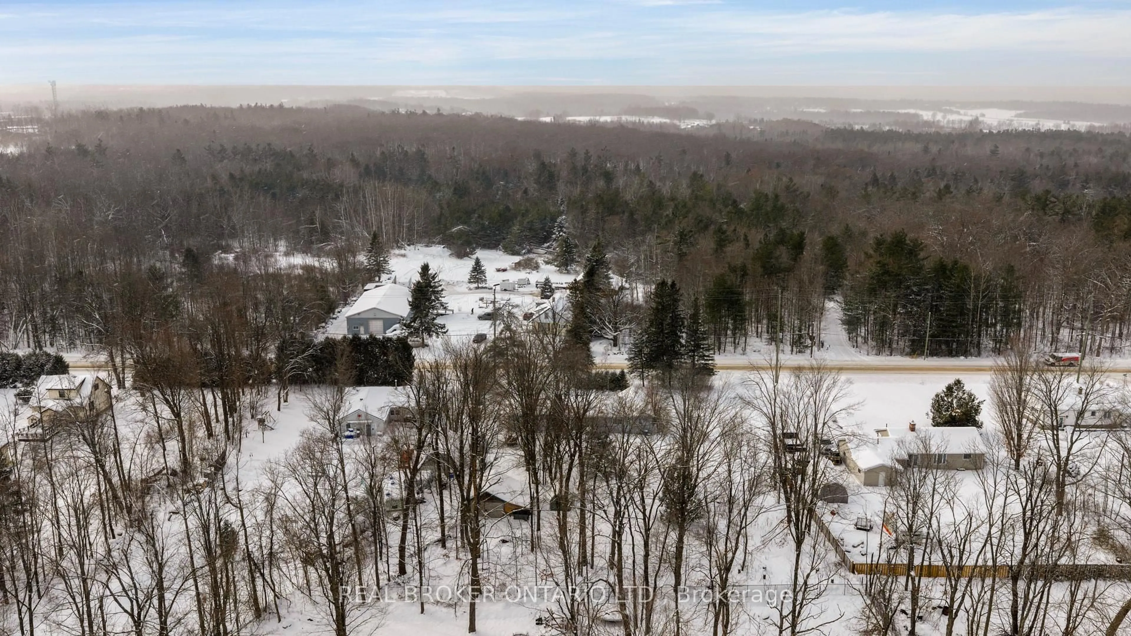 A pic from outside/outdoor area/front of a property/back of a property/a pic from drone, forest/trees view for 4233 Carlyon Line, Orillia Ontario L3V 0W8
