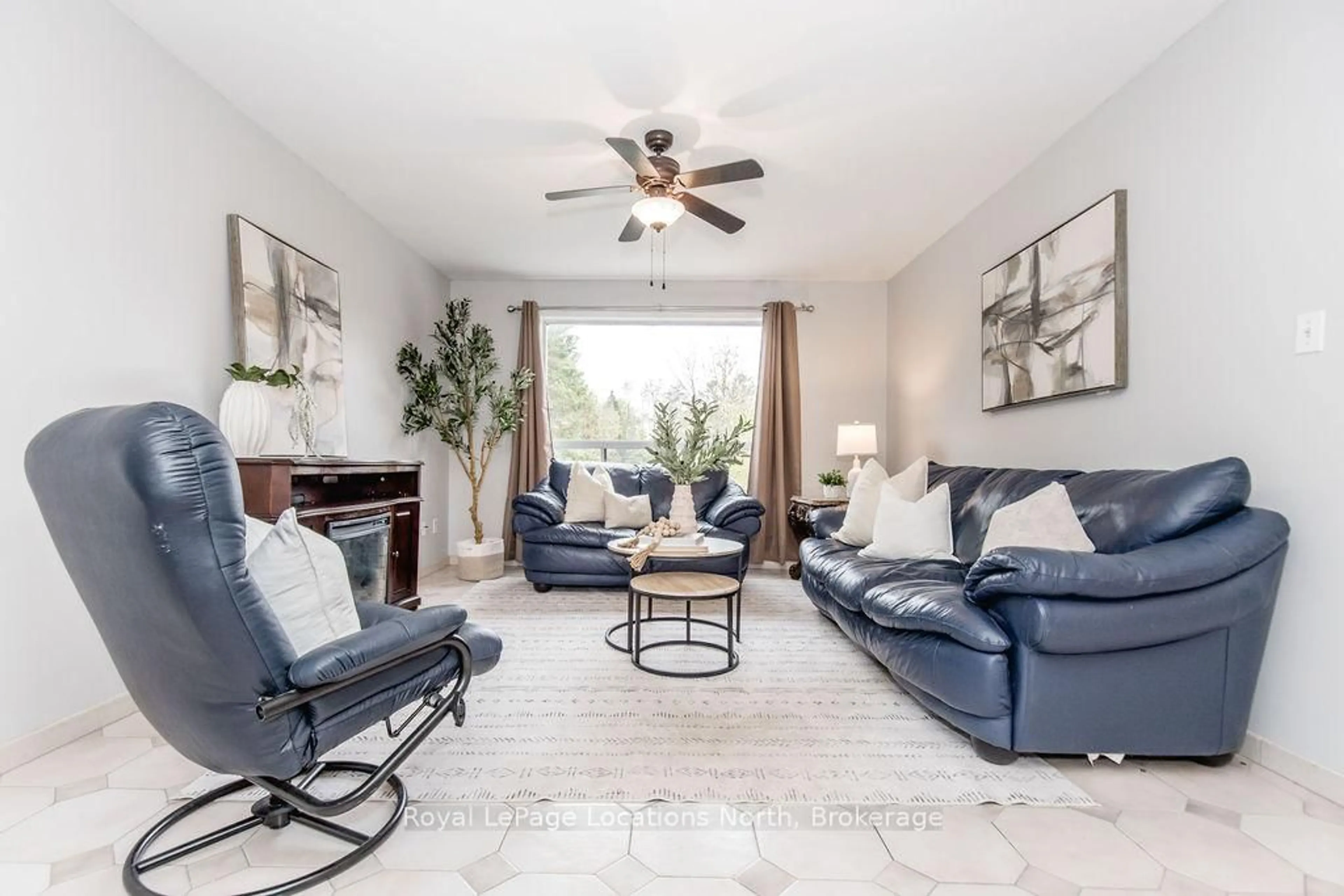 Living room with furniture, ceramic/tile floor for 3 51st St, Wasaga Beach Ontario L9Z 1X5