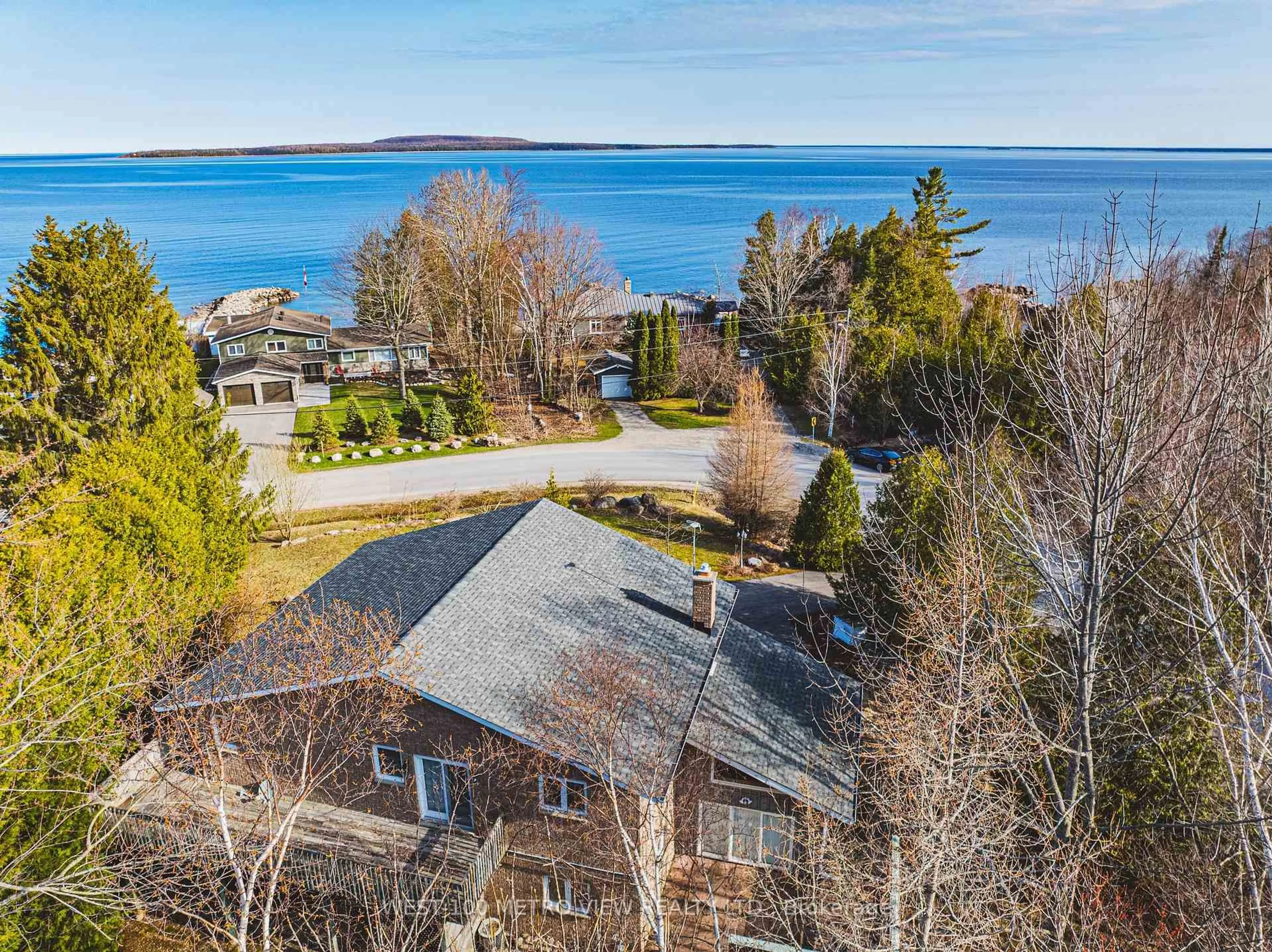 A pic from outside/outdoor area/front of a property/back of a property/a pic from drone, water/lake/river/ocean view for 2476 Champlain Rd, Tiny Ontario L9M 0C3