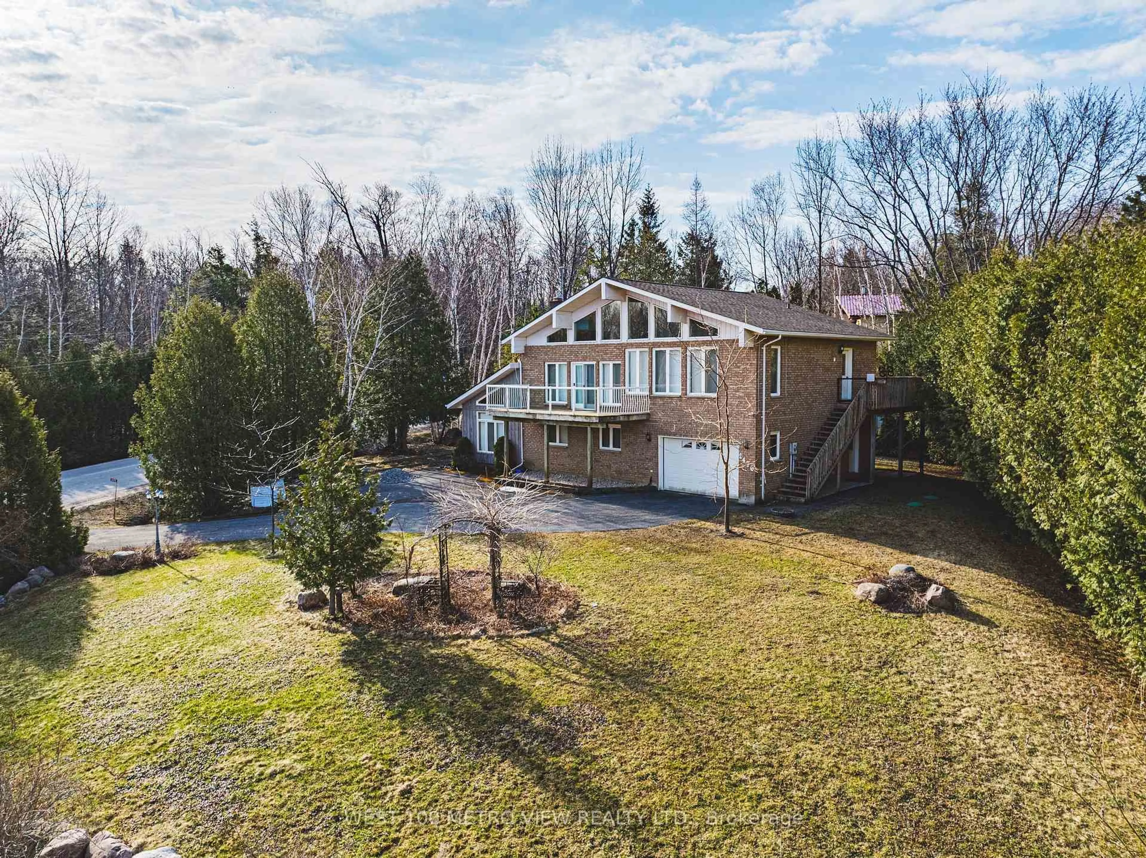 A pic from outside/outdoor area/front of a property/back of a property/a pic from drone, unknown for 2476 Champlain Rd, Tiny Ontario L9M 0C3