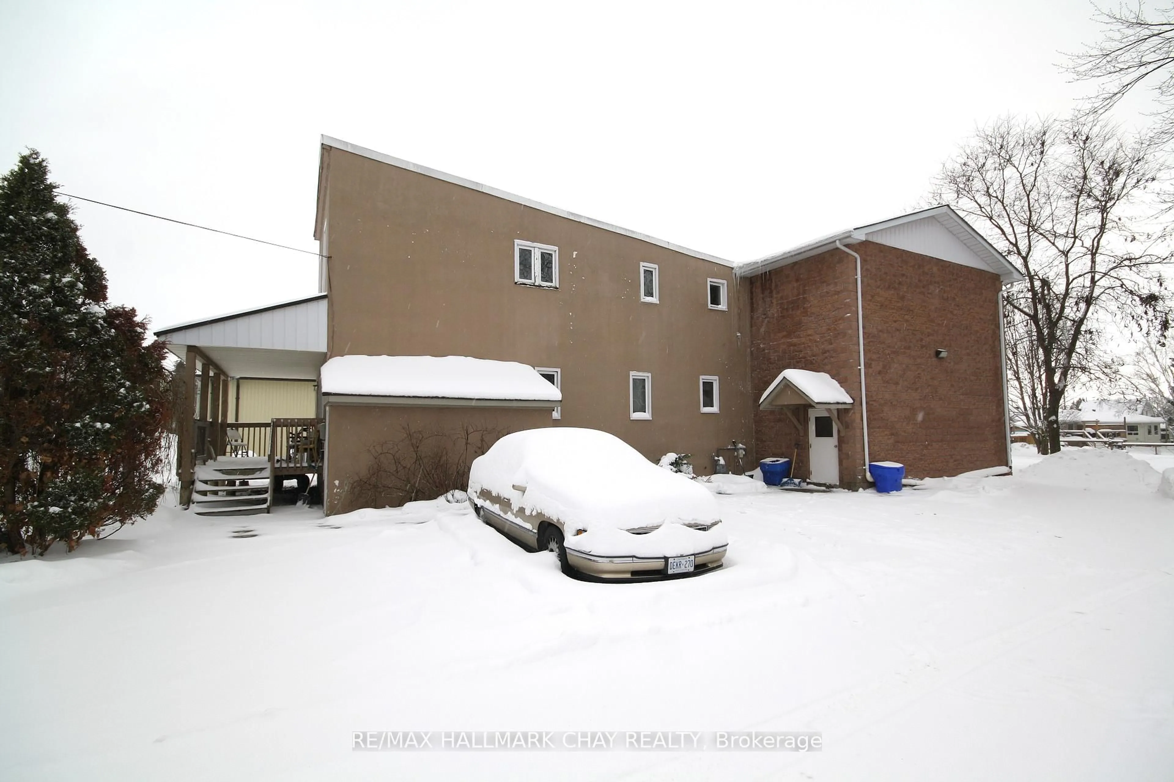 A pic from outside/outdoor area/front of a property/back of a property/a pic from drone, unknown for 12 SHAW St, Springwater Ontario L0L 1P0