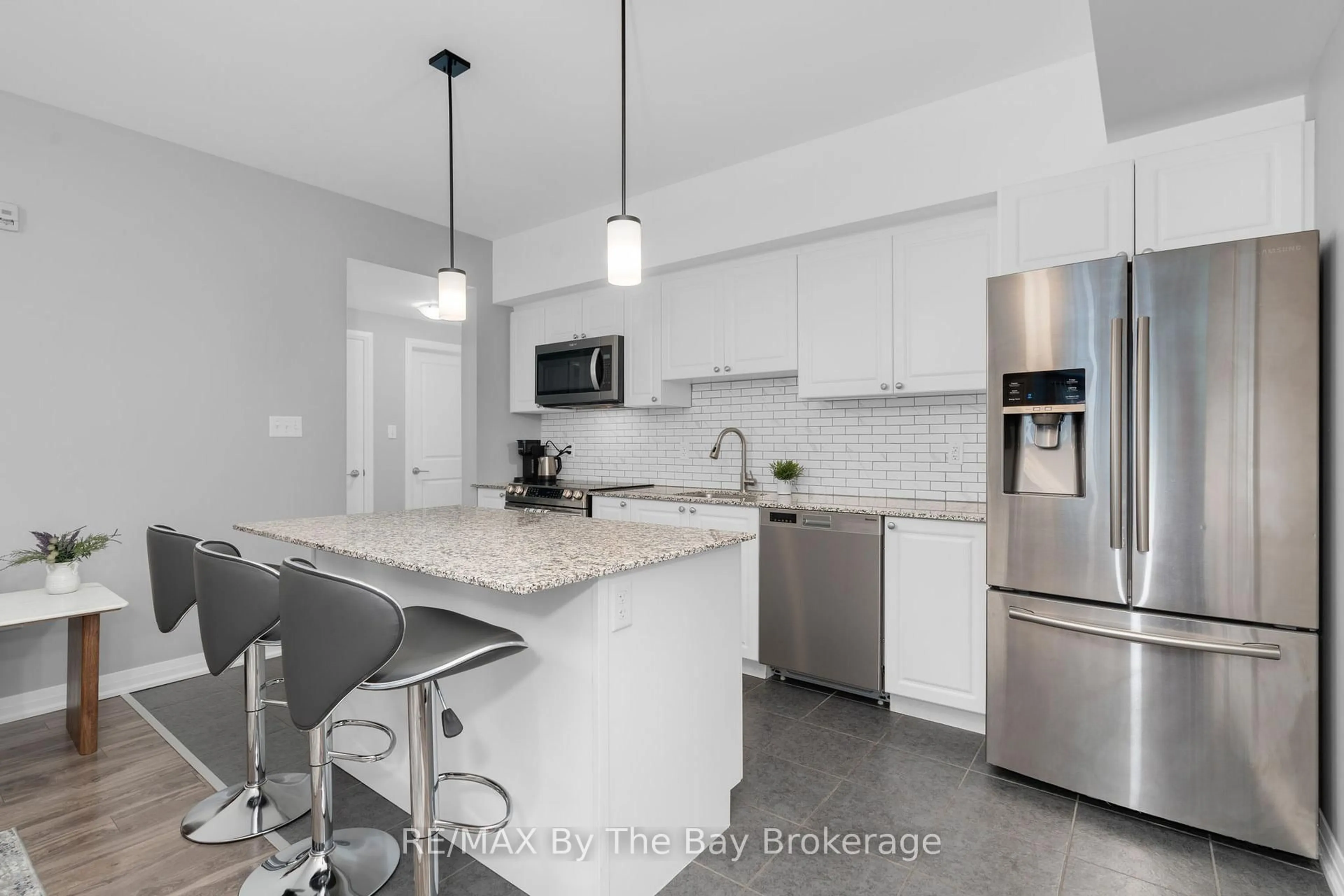 Open concept kitchen, ceramic/tile floor for 300 ESSA Rd #309, Barrie Ontario L9J 0B9