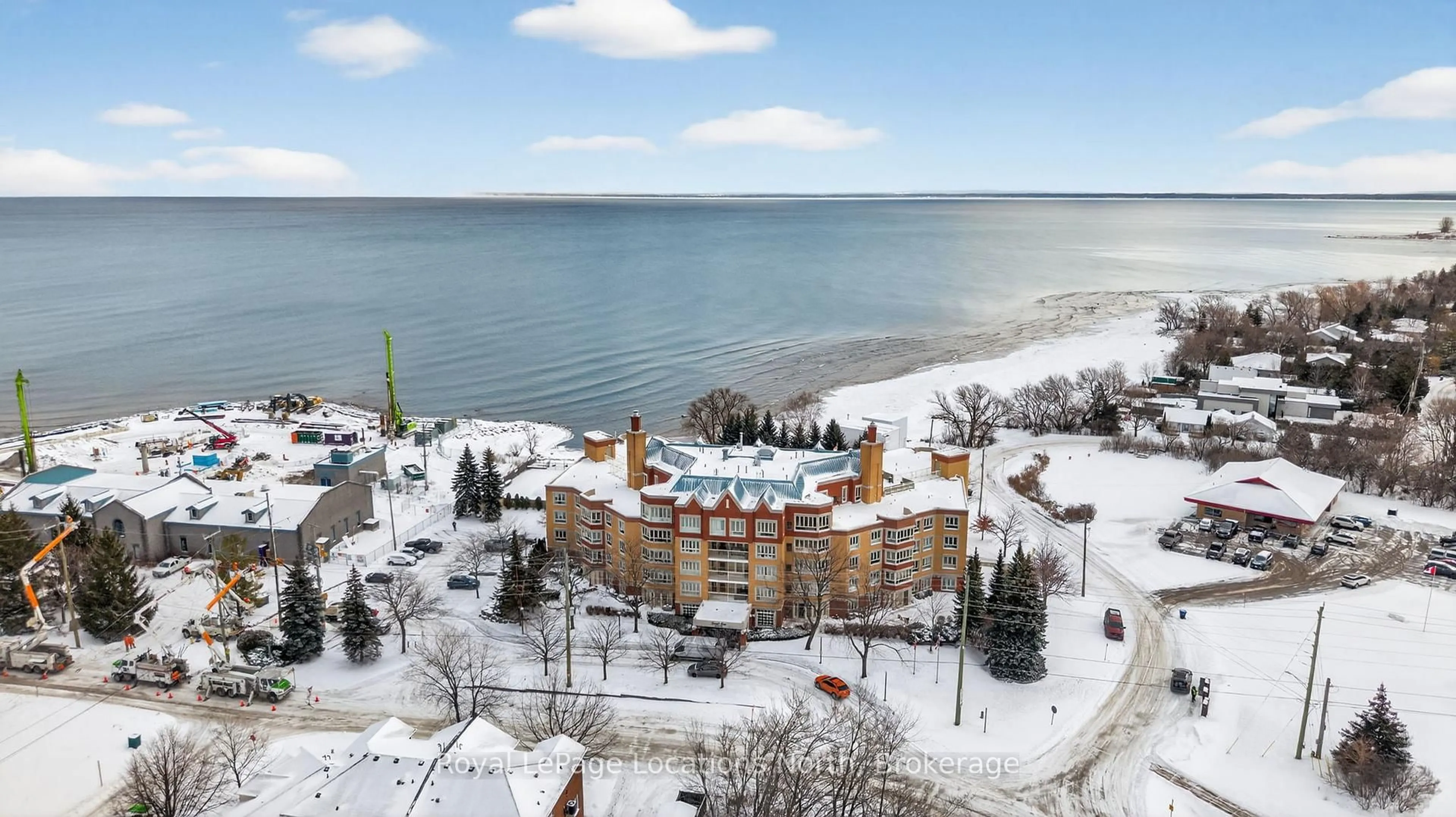 A pic from outside/outdoor area/front of a property/back of a property/a pic from drone, water/lake/river/ocean view for 16 Raglan St #401, Collingwood Ontario L9Y 4Y2