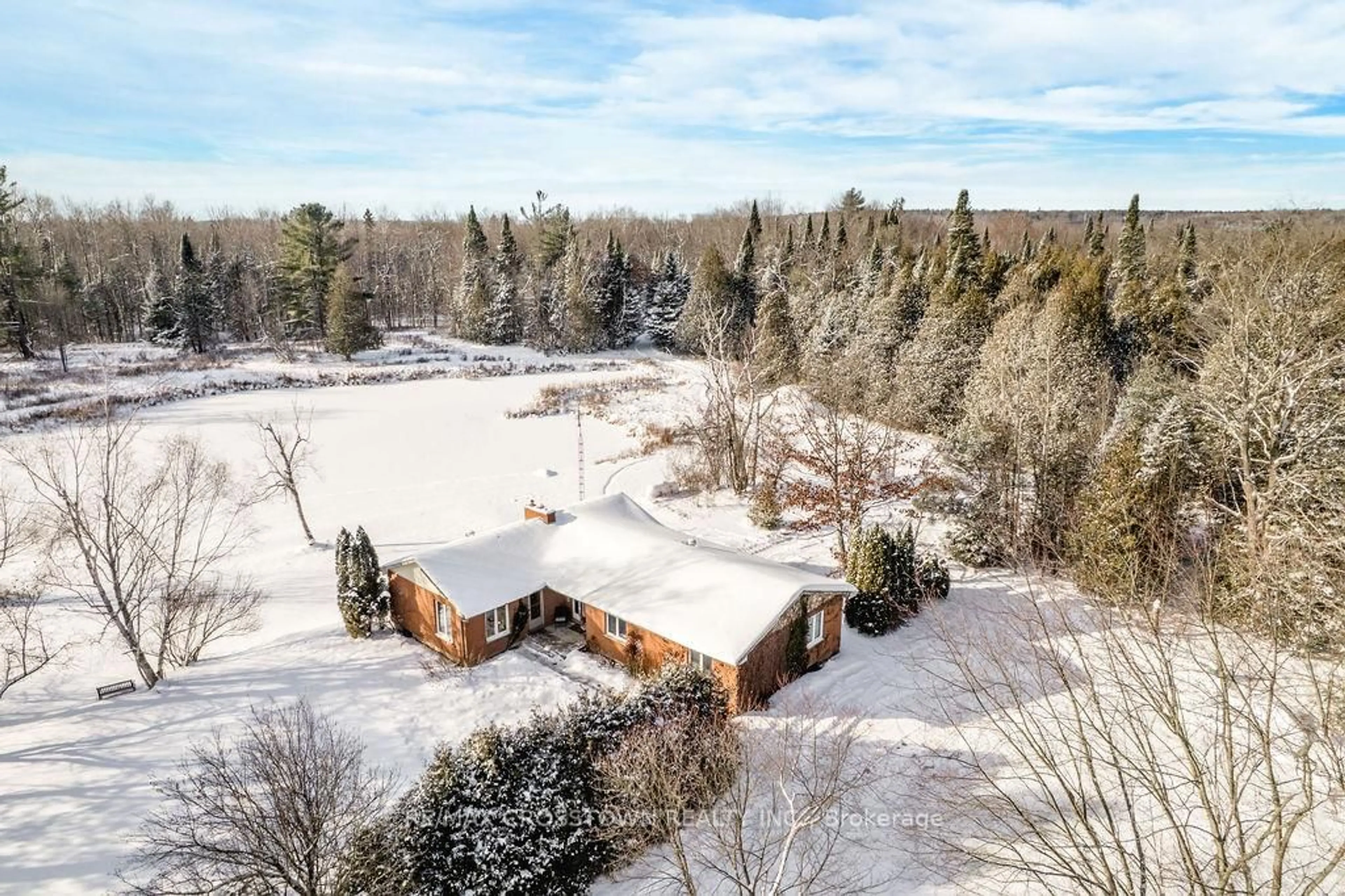 A pic from outside/outdoor area/front of a property/back of a property/a pic from drone, unknown for 12036 County Rd 27, Springwater Ontario L9X 0M1