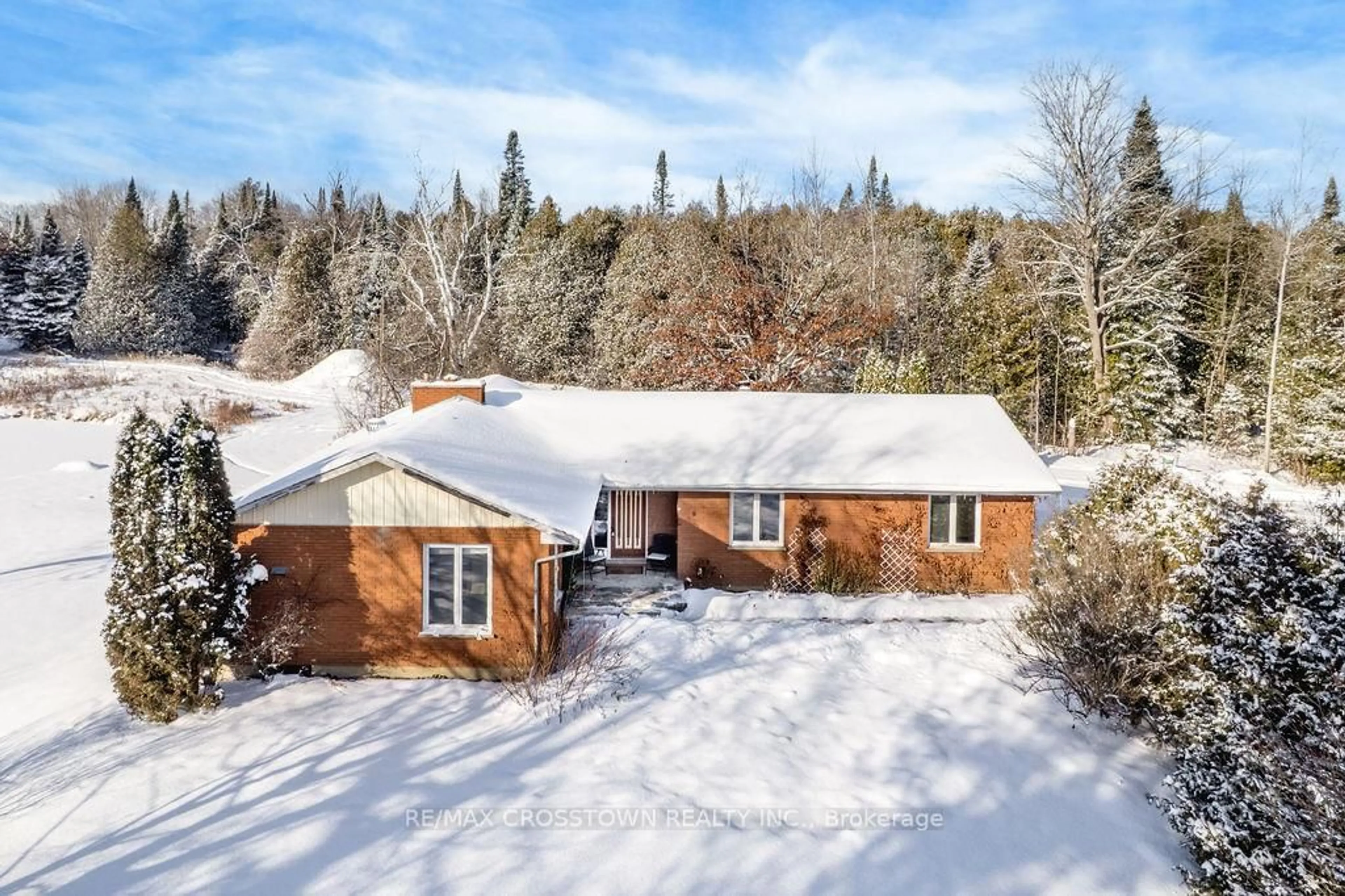A pic from outside/outdoor area/front of a property/back of a property/a pic from drone, unknown for 12036 County Rd 27, Springwater Ontario L9X 0M1