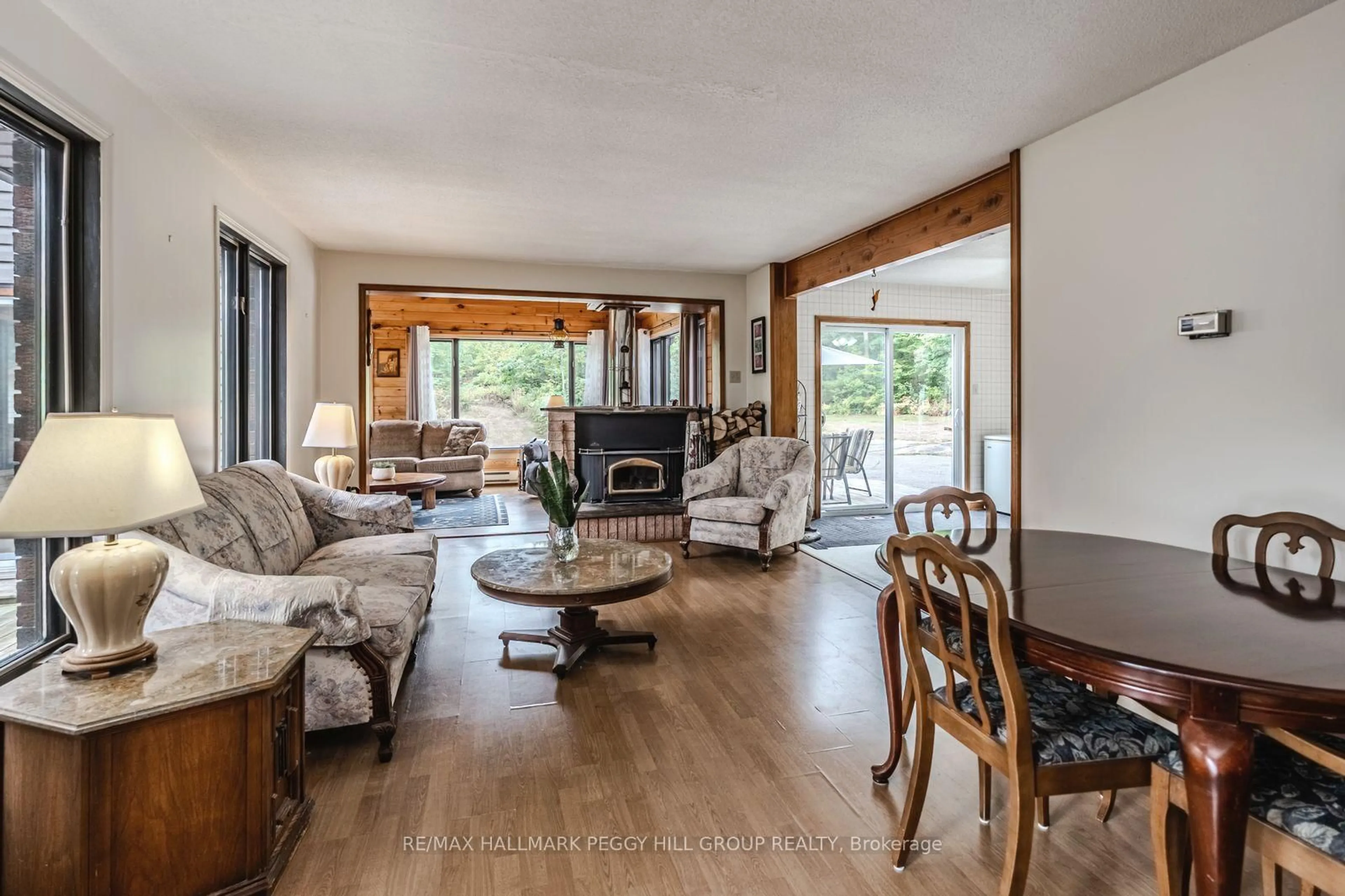 Living room with furniture, wood/laminate floor for 1506 Torpitt Rd, Severn Ontario P0E 1N0