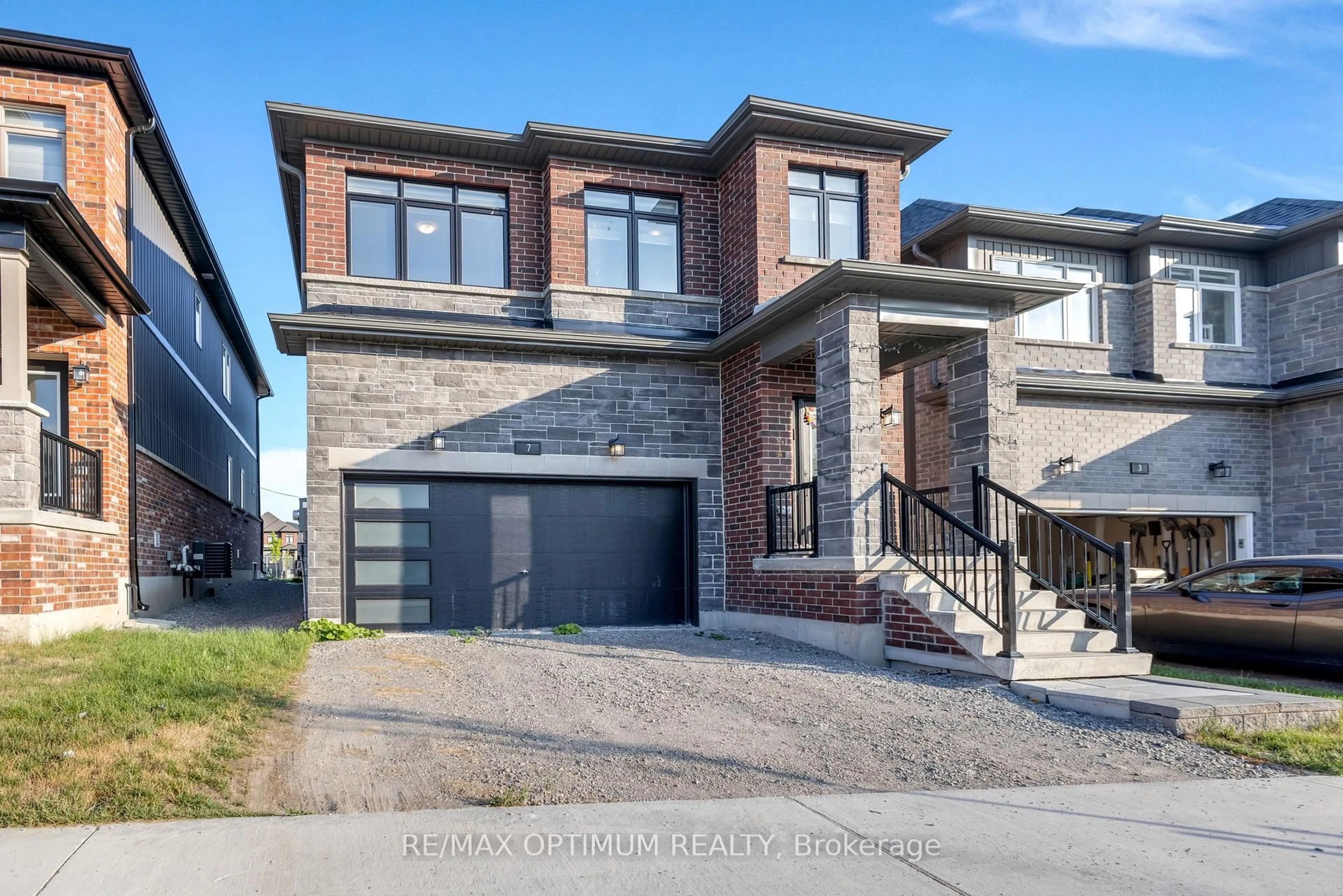 Home with brick exterior material, street for 7 Barnyard Tr, Barrie Ontario L9J 0Y1