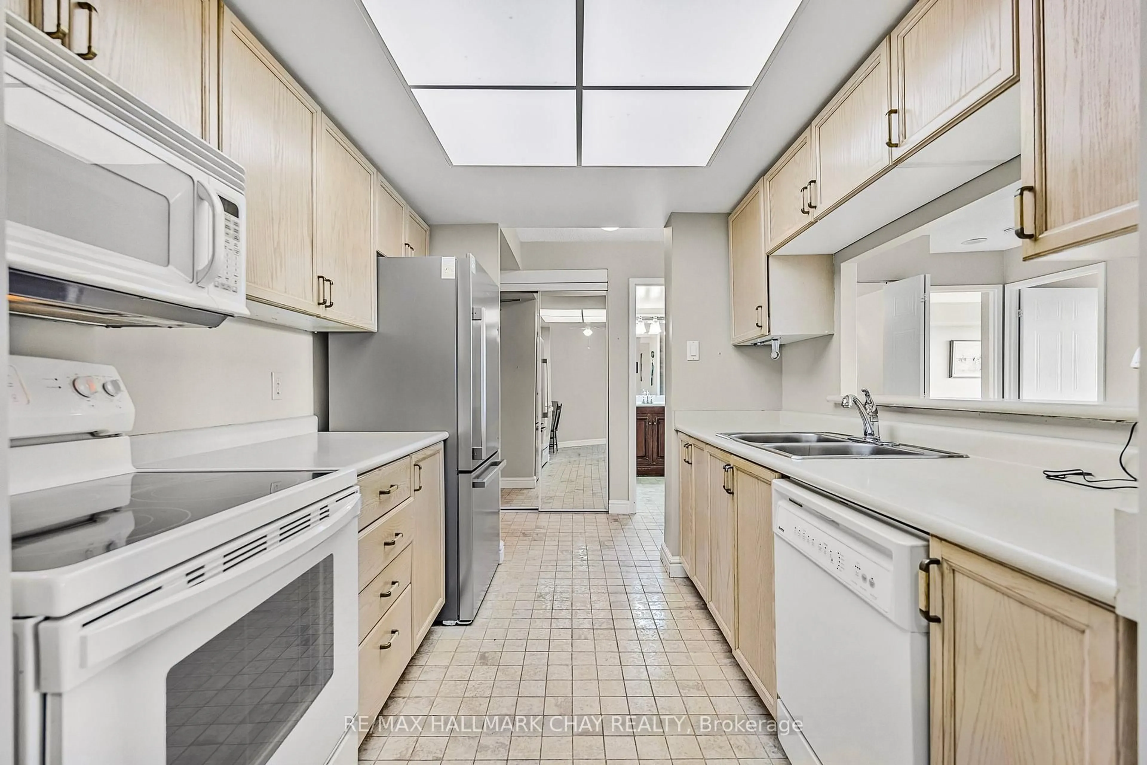 Standard kitchen, ceramic/tile floor for 65 Ellen St #205, Barrie Ontario L4N 3A5