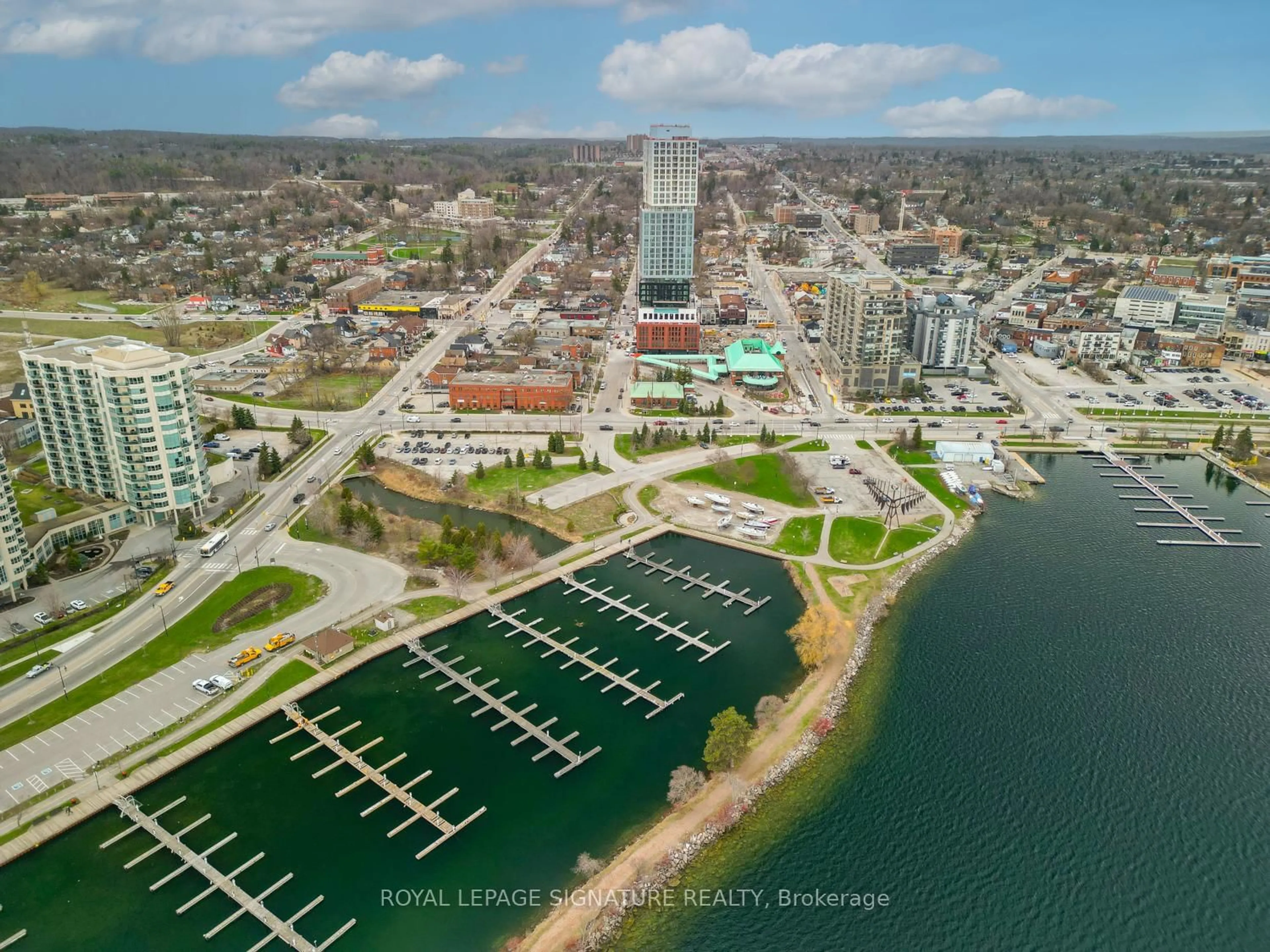 A pic from outside/outdoor area/front of a property/back of a property/a pic from drone, water/lake/river/ocean view for 39 Mary St #2201, Barrie Ontario L4N 1S9