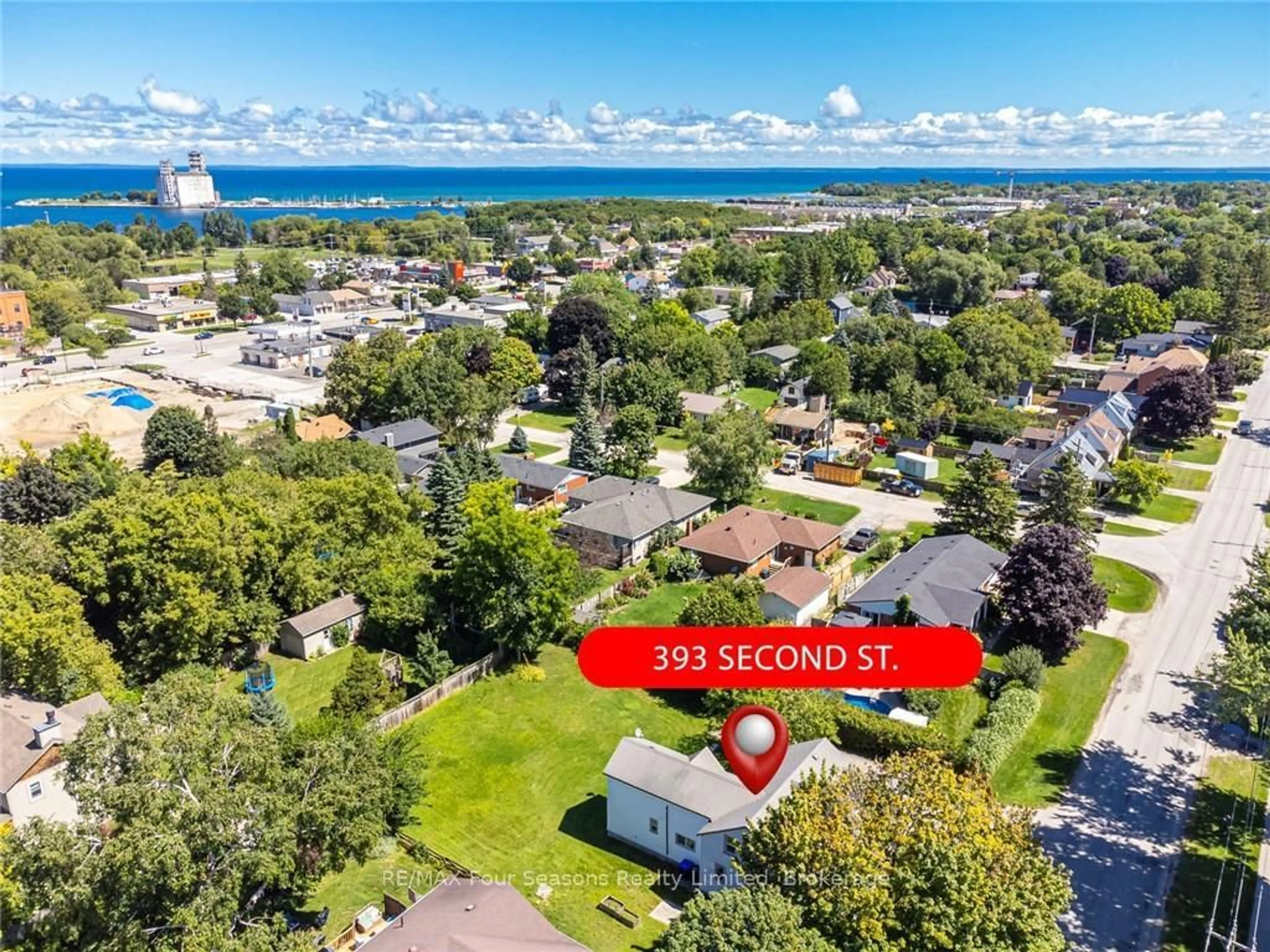 A pic from outside/outdoor area/front of a property/back of a property/a pic from drone, water/lake/river/ocean view for 393 Second St, Collingwood Ontario L9Y 1G9