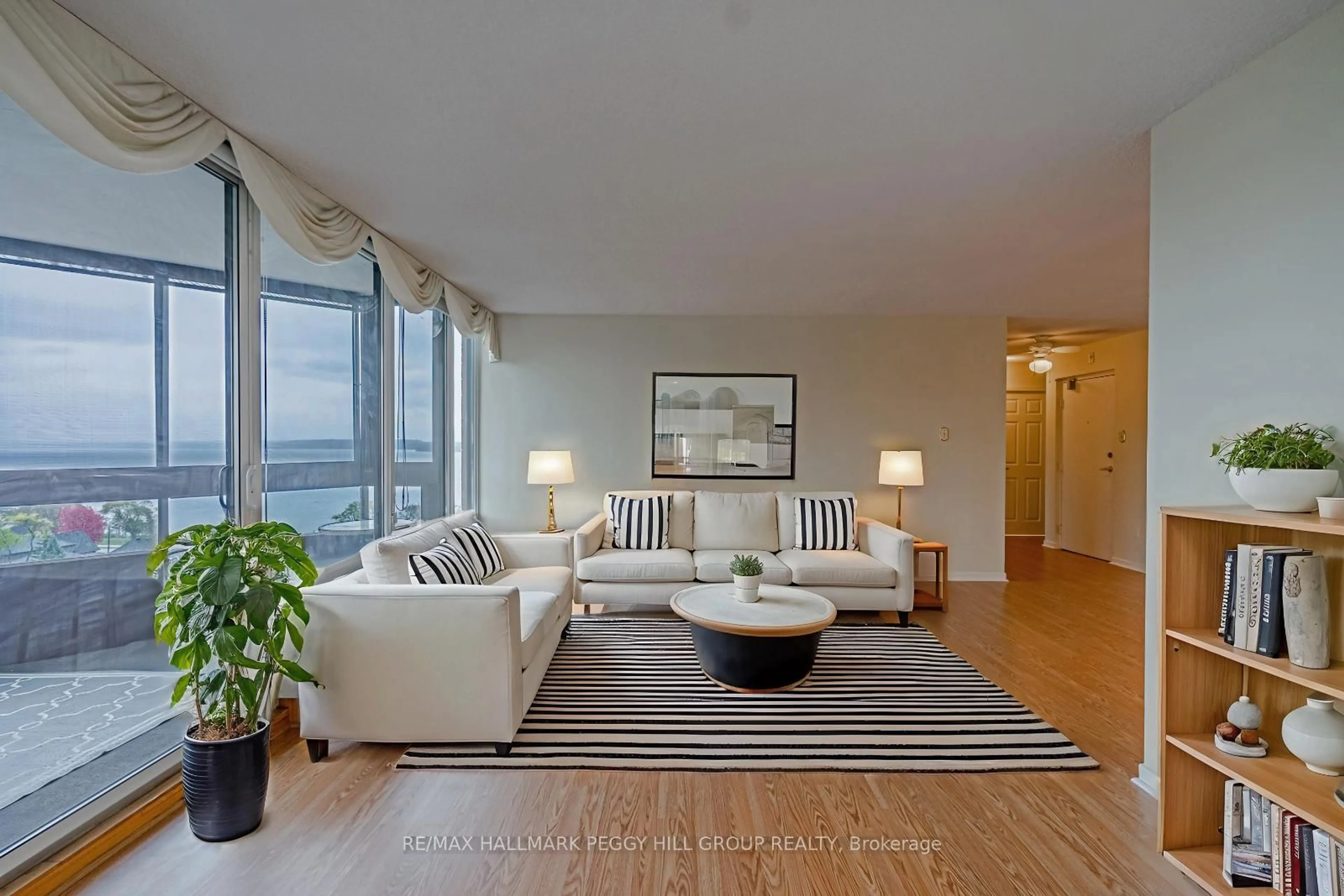 Living room with furniture, unknown for 181 Collier St #803, Barrie Ontario L4M 5L6