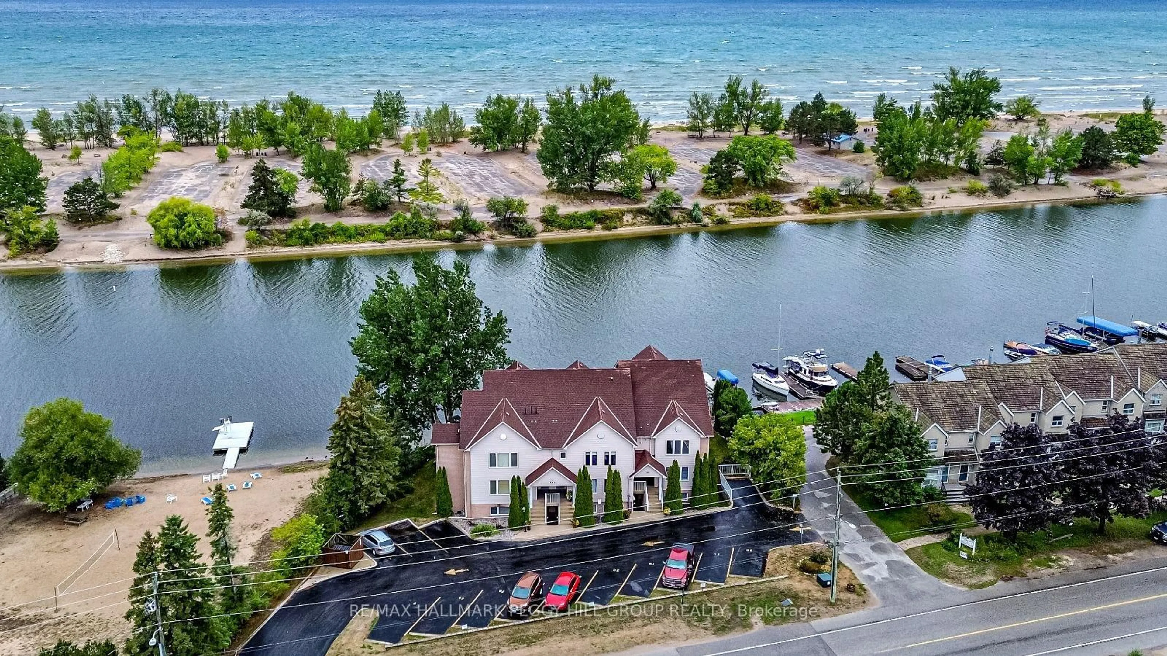 A pic from outside/outdoor area/front of a property/back of a property/a pic from drone, water/lake/river/ocean view for 194 River Rd #3B, Wasaga Beach Ontario L9Z 2L6