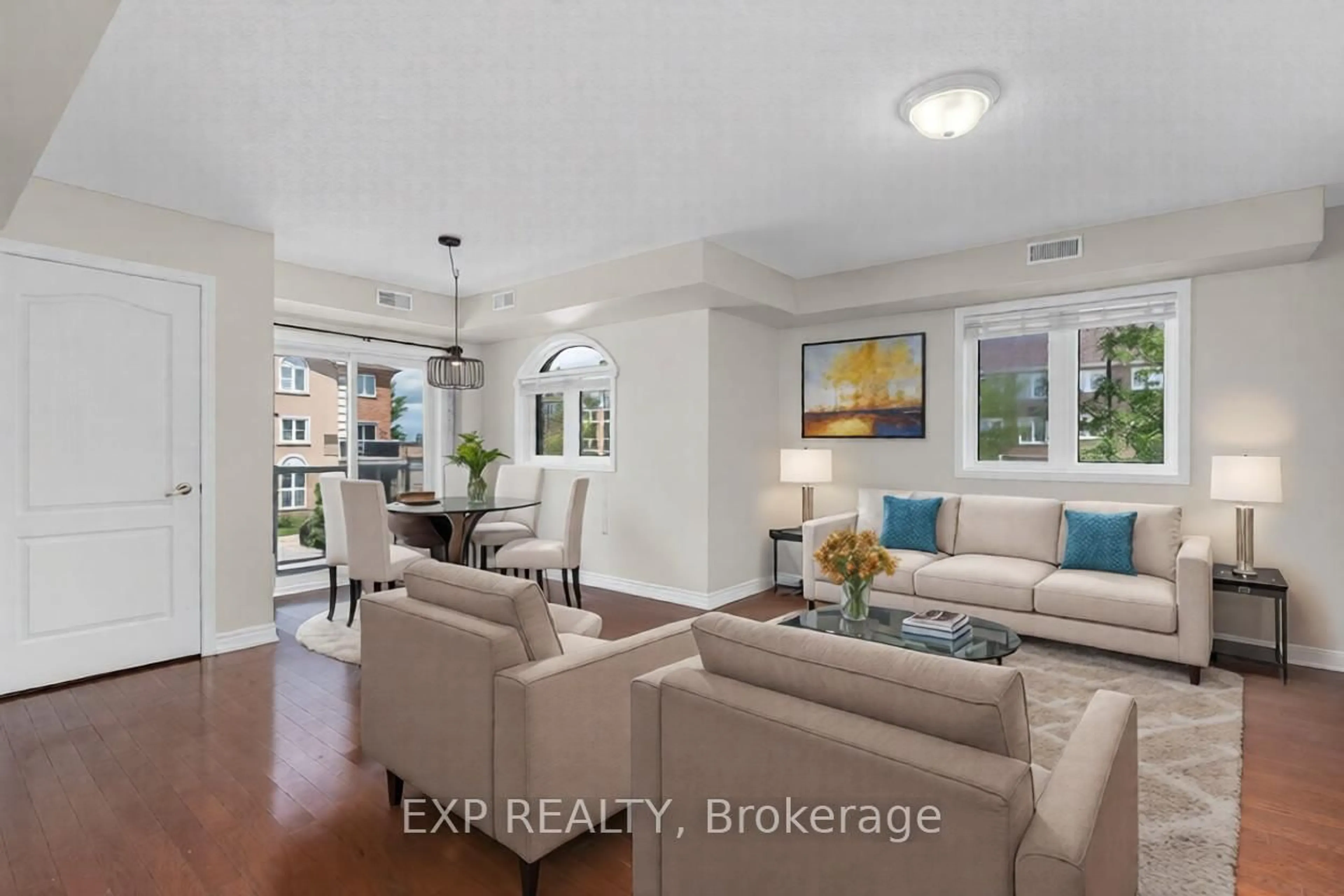 Living room with furniture, ceramic/tile floor for 135 Sydenham Wells #3, Barrie Ontario L4M 0H3