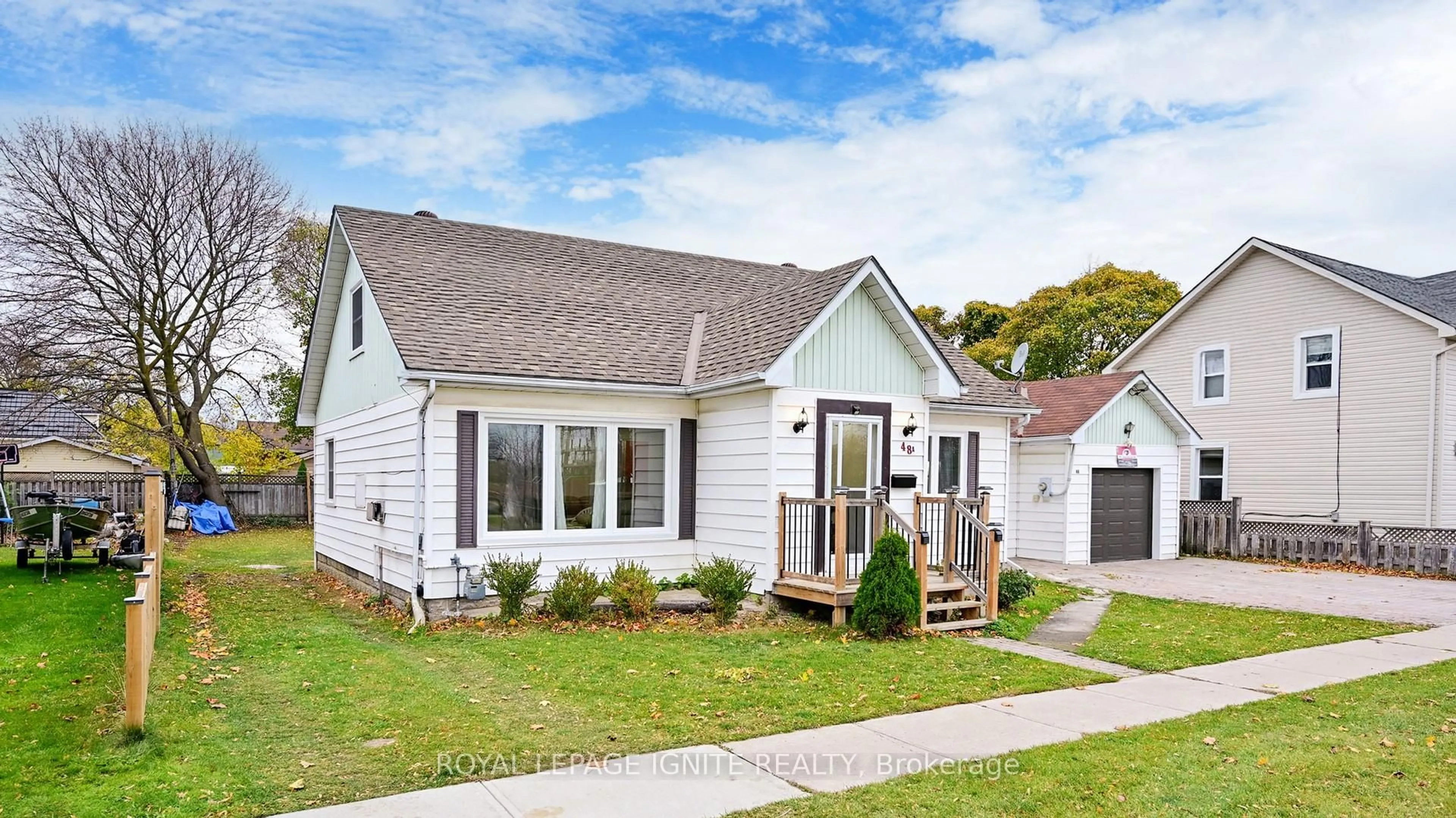 Home with vinyl exterior material, street for 48 Moberly St, Collingwood Ontario L9Y 3W9