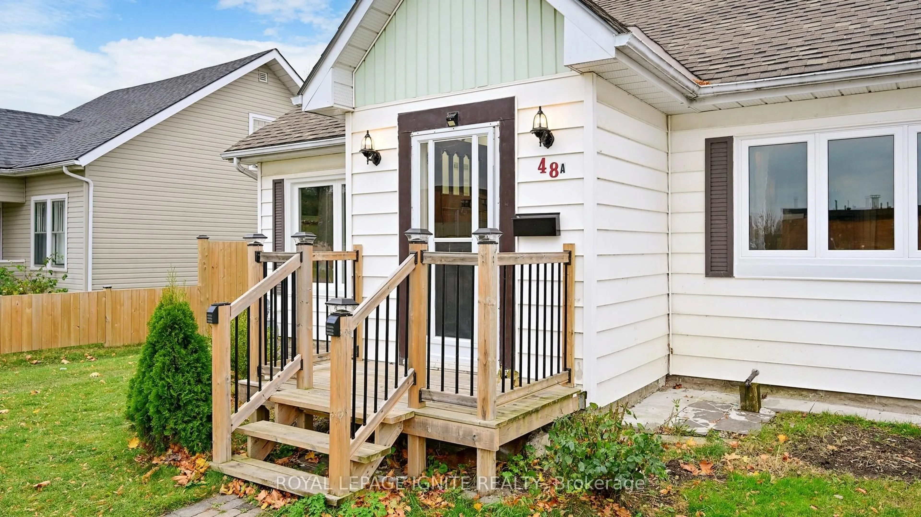 Home with vinyl exterior material, street for 48 Moberly St, Collingwood Ontario L9Y 3W9