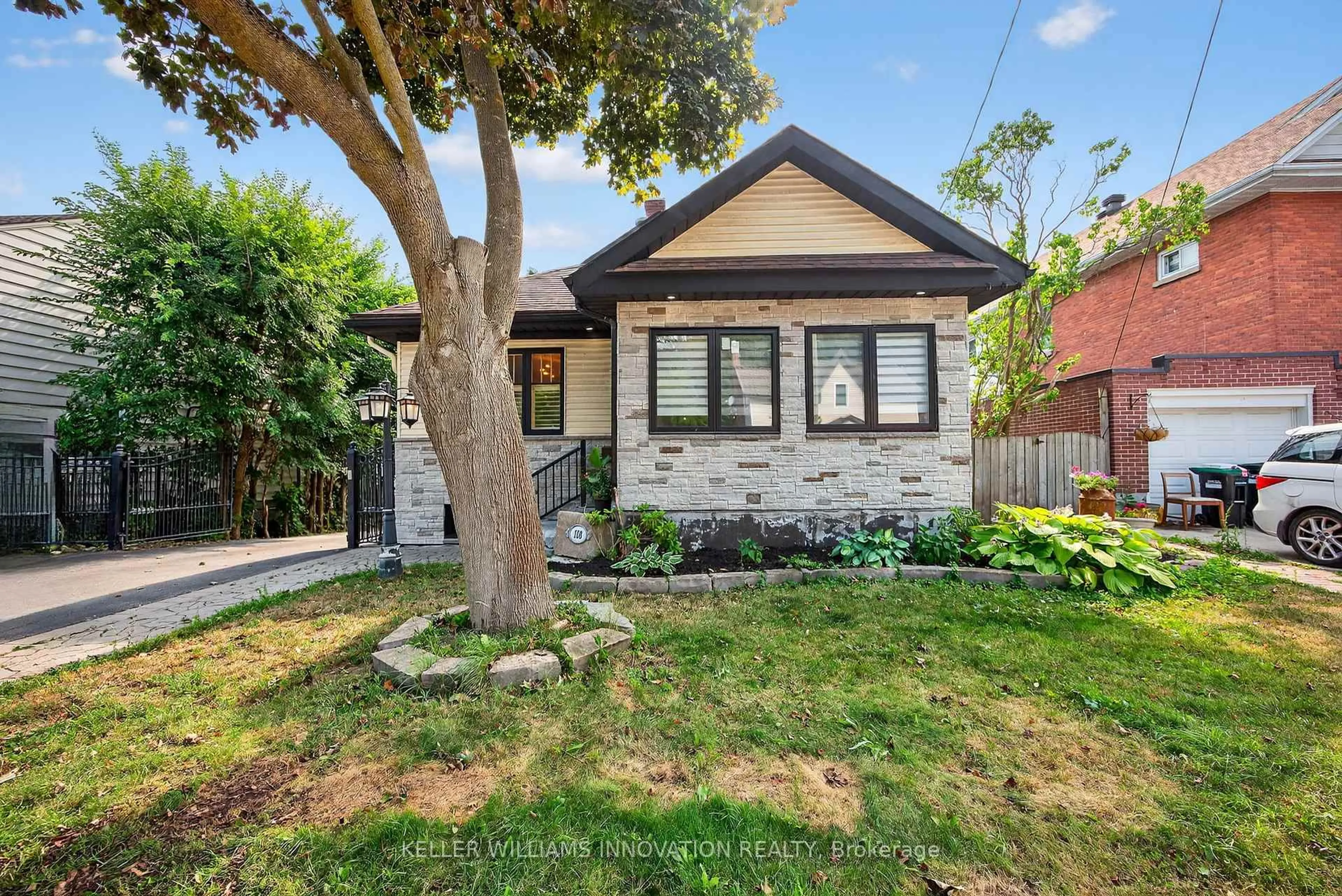 Home with brick exterior material, street for 108 Owen St, Barrie Ontario L4M 3H7