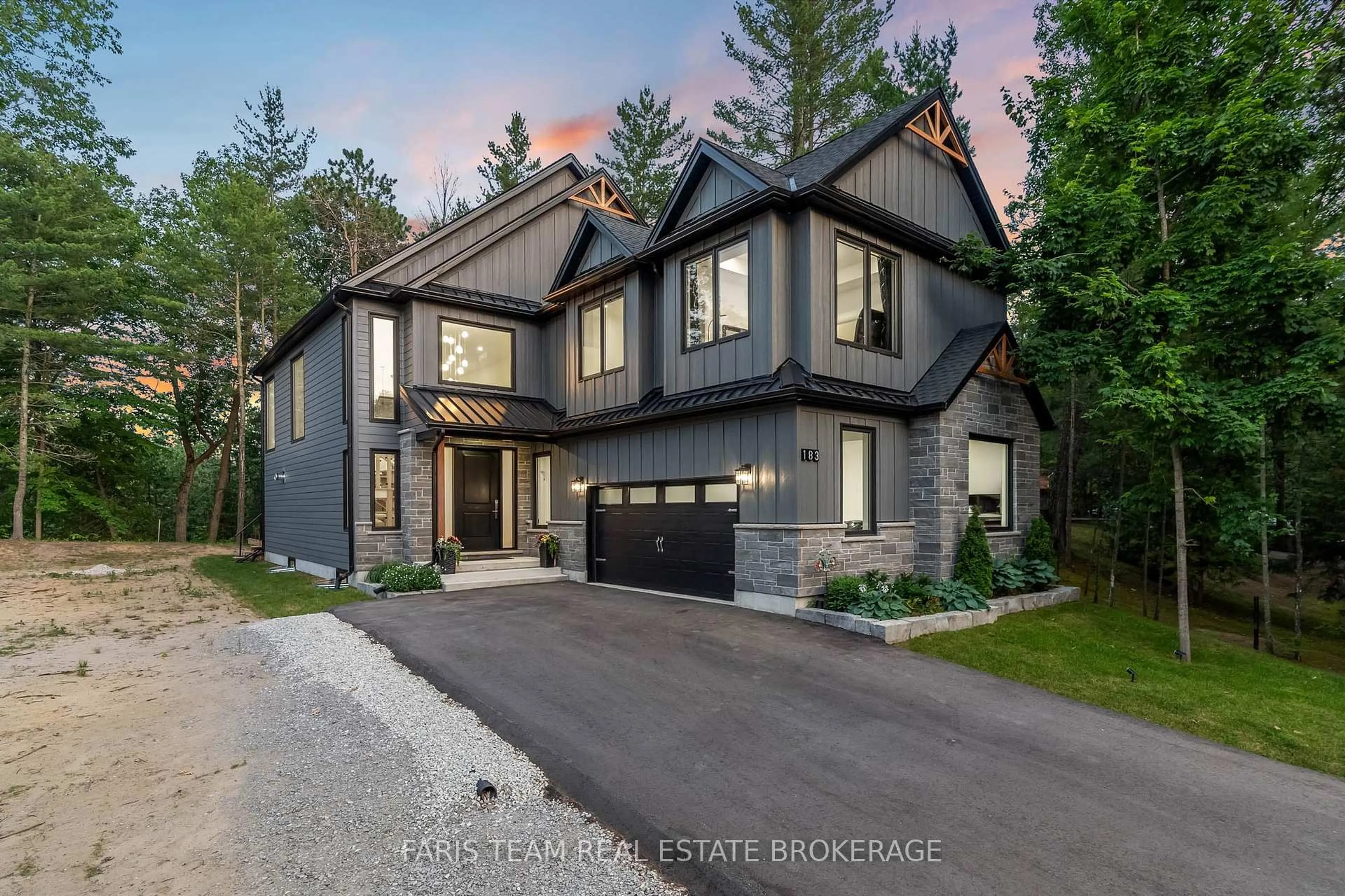 Home with brick exterior material, street for 183 Woodland Dr, Wasaga Beach Ontario L9Z 2V4