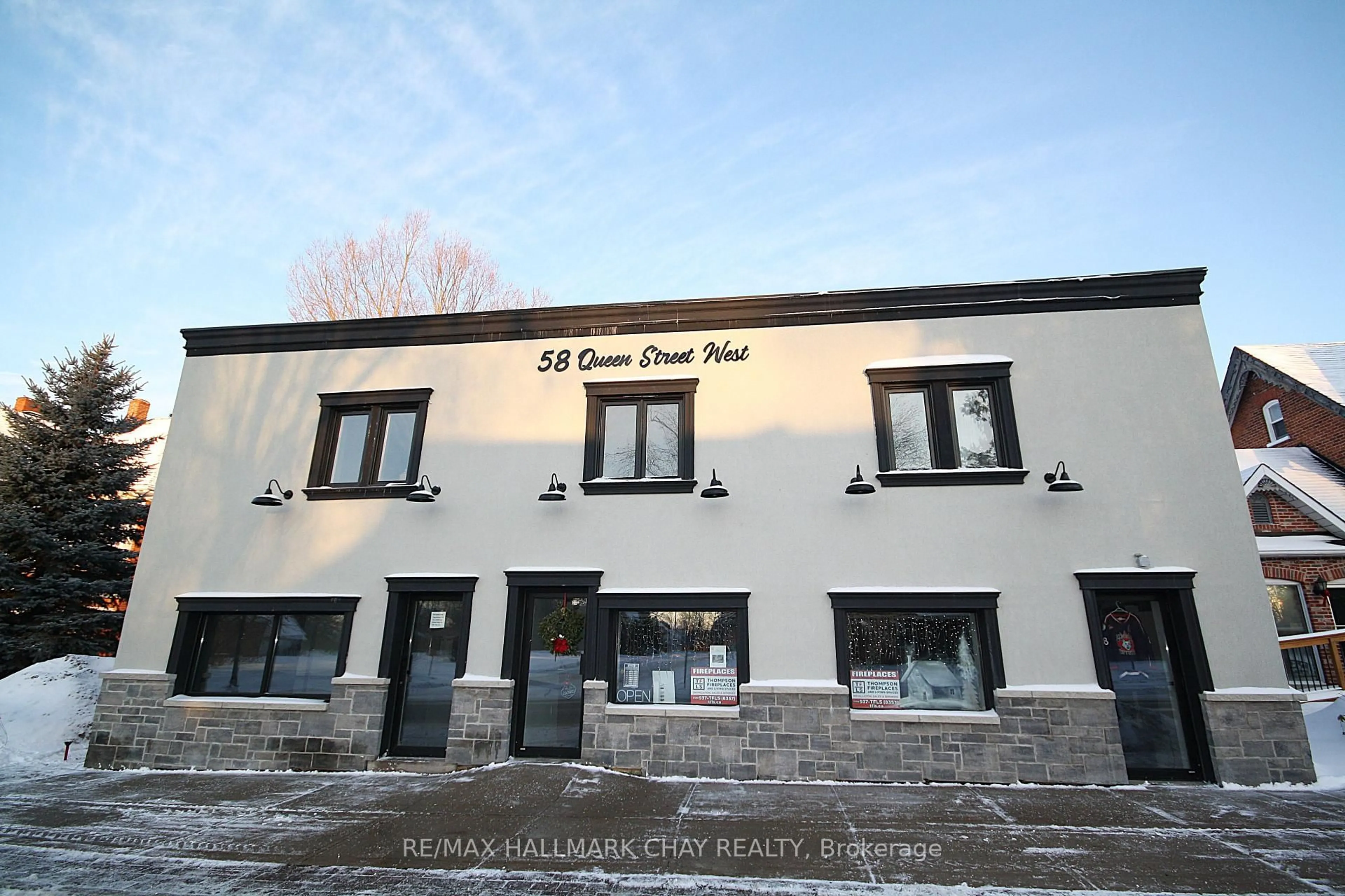 A pic from outside/outdoor area/front of a property/back of a property/a pic from drone, street for 58 Queen St St, Springwater Ontario L0L 1P0