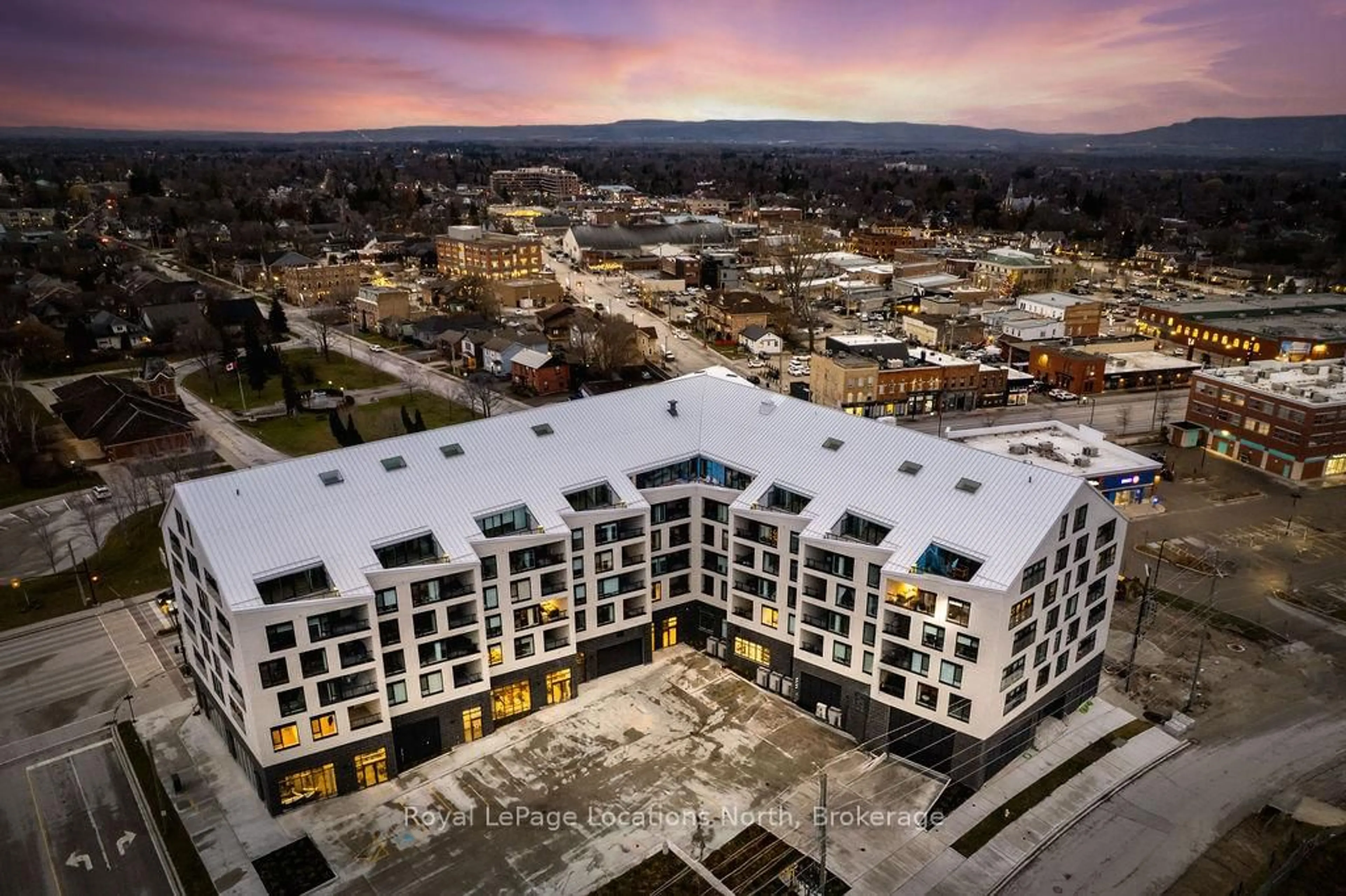 A pic from outside/outdoor area/front of a property/back of a property/a pic from drone, unknown for 31 Huron St #523, Collingwood Ontario L0G 1V0