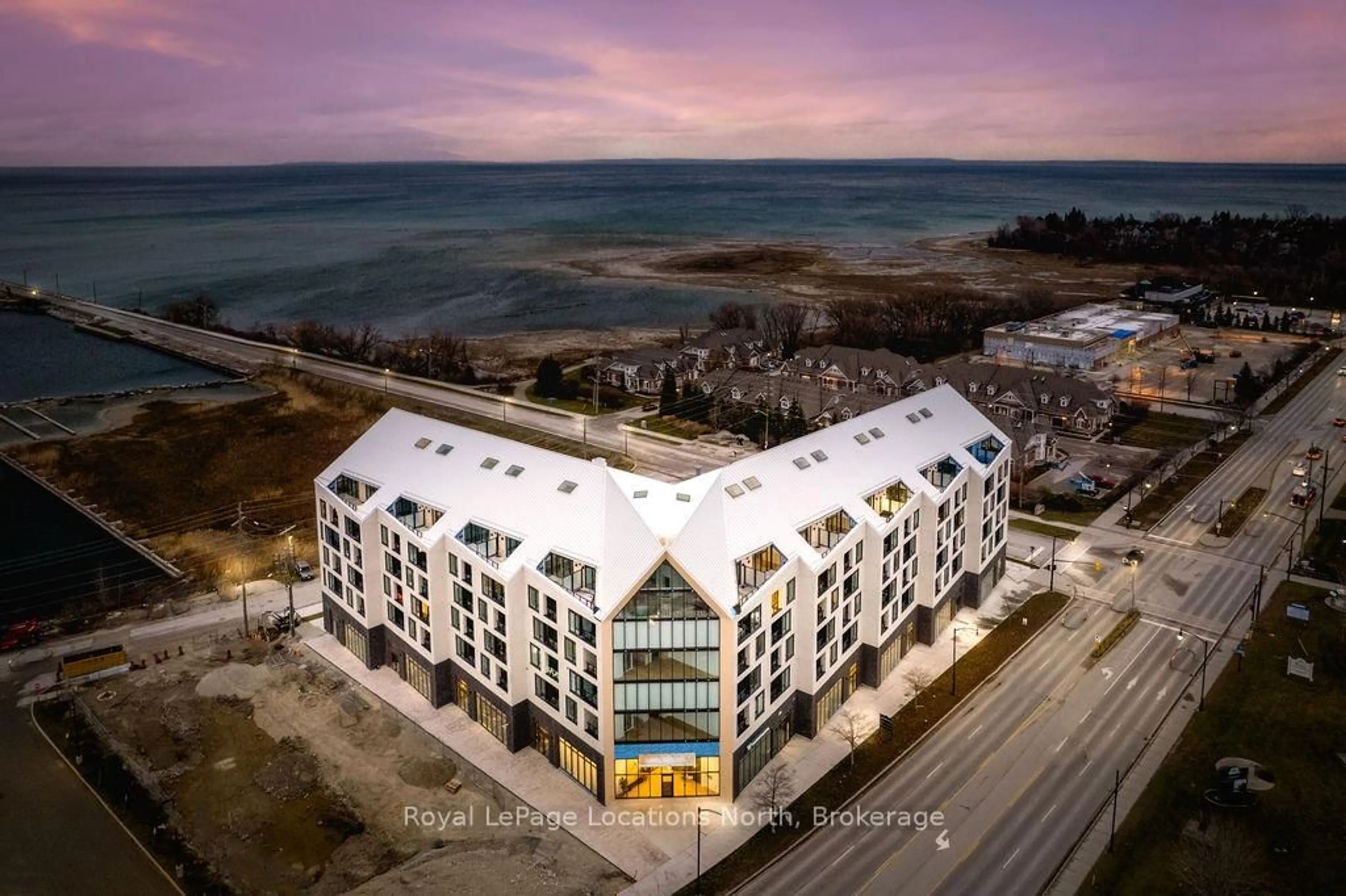 A pic from outside/outdoor area/front of a property/back of a property/a pic from drone, building for 31 Huron St #523, Collingwood Ontario L0G 1V0