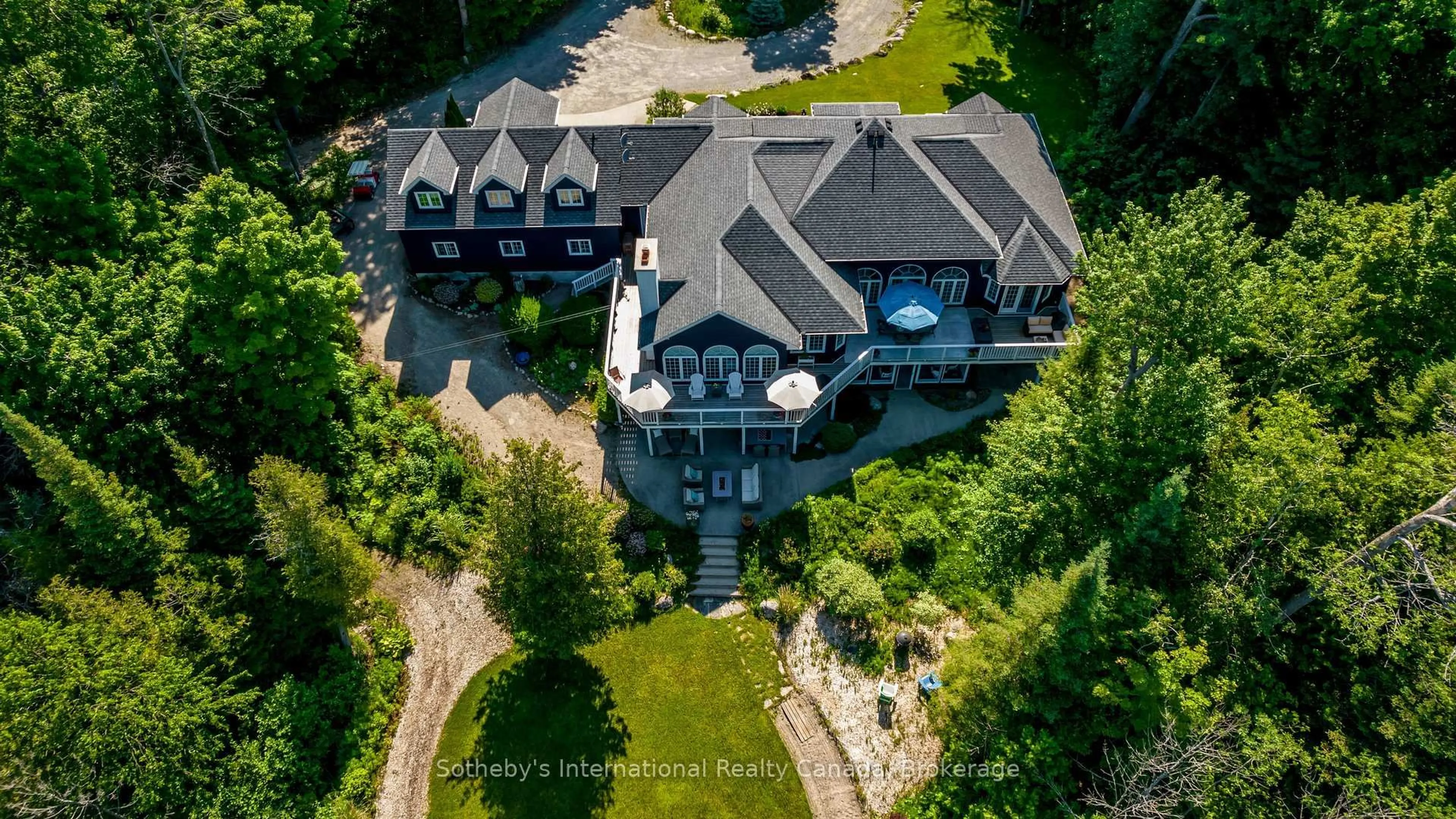 A pic from outside/outdoor area/front of a property/back of a property/a pic from drone, unknown for 679 Sandy Bay Rd, Tiny Ontario L9M 0H6