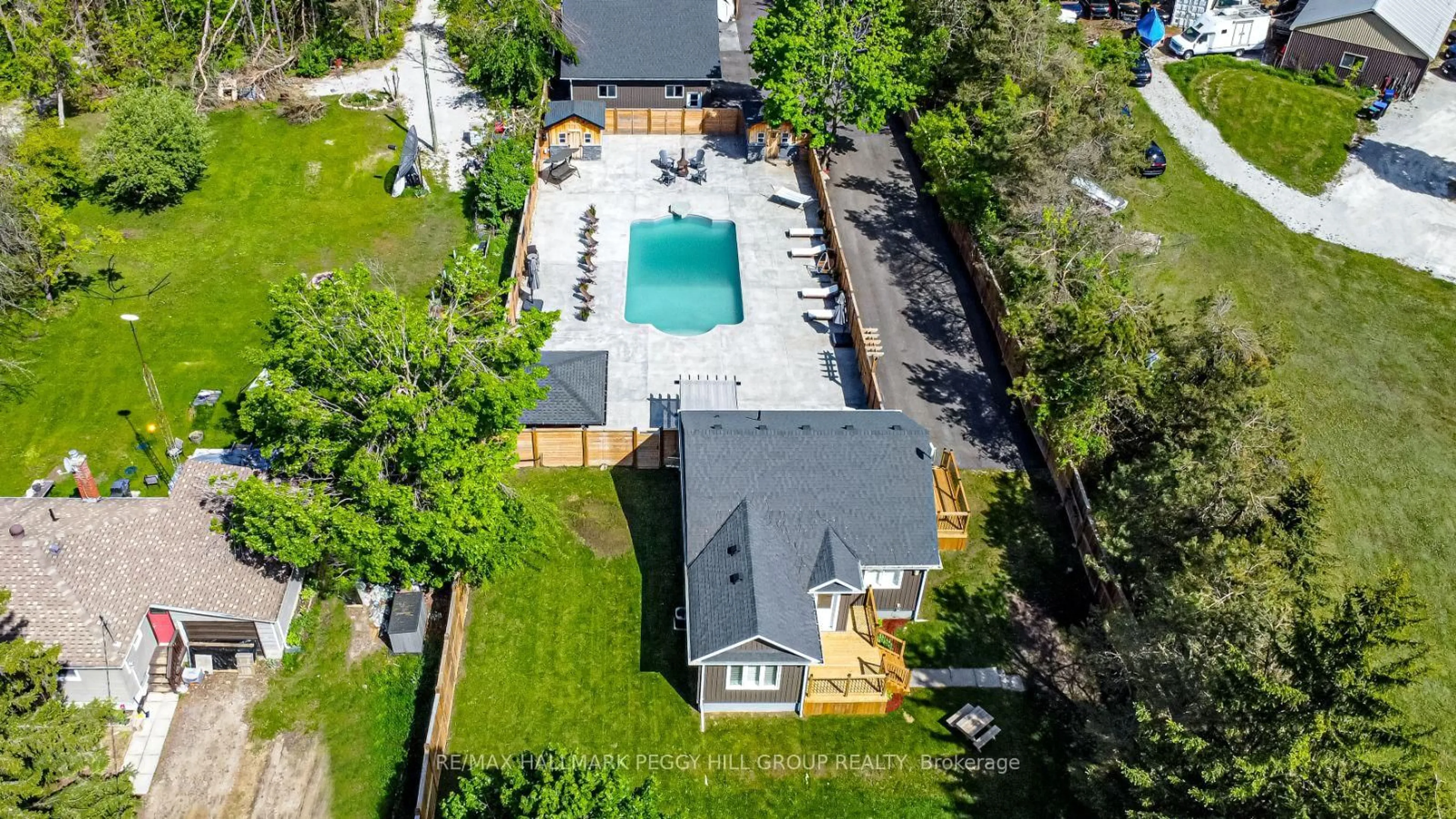 A pic from outside/outdoor area/front of a property/back of a property/a pic from drone, street for 2484 Highway 11, Oro-Medonte Ontario L0L 2E0