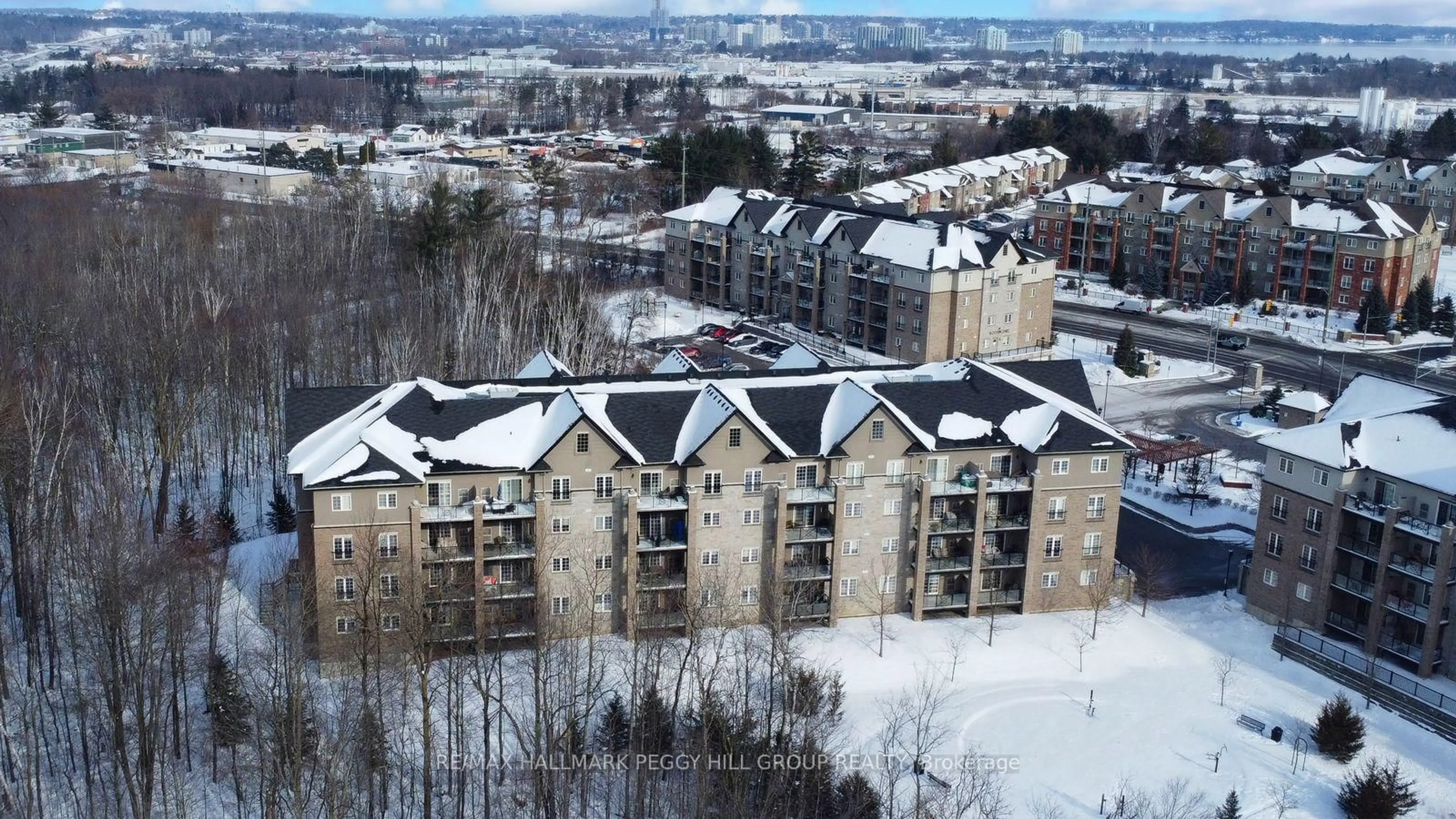 A pic from outside/outdoor area/front of a property/back of a property/a pic from drone, city buildings view from balcony for 44 Ferndale Dr #212, Barrie Ontario L4N 2V1
