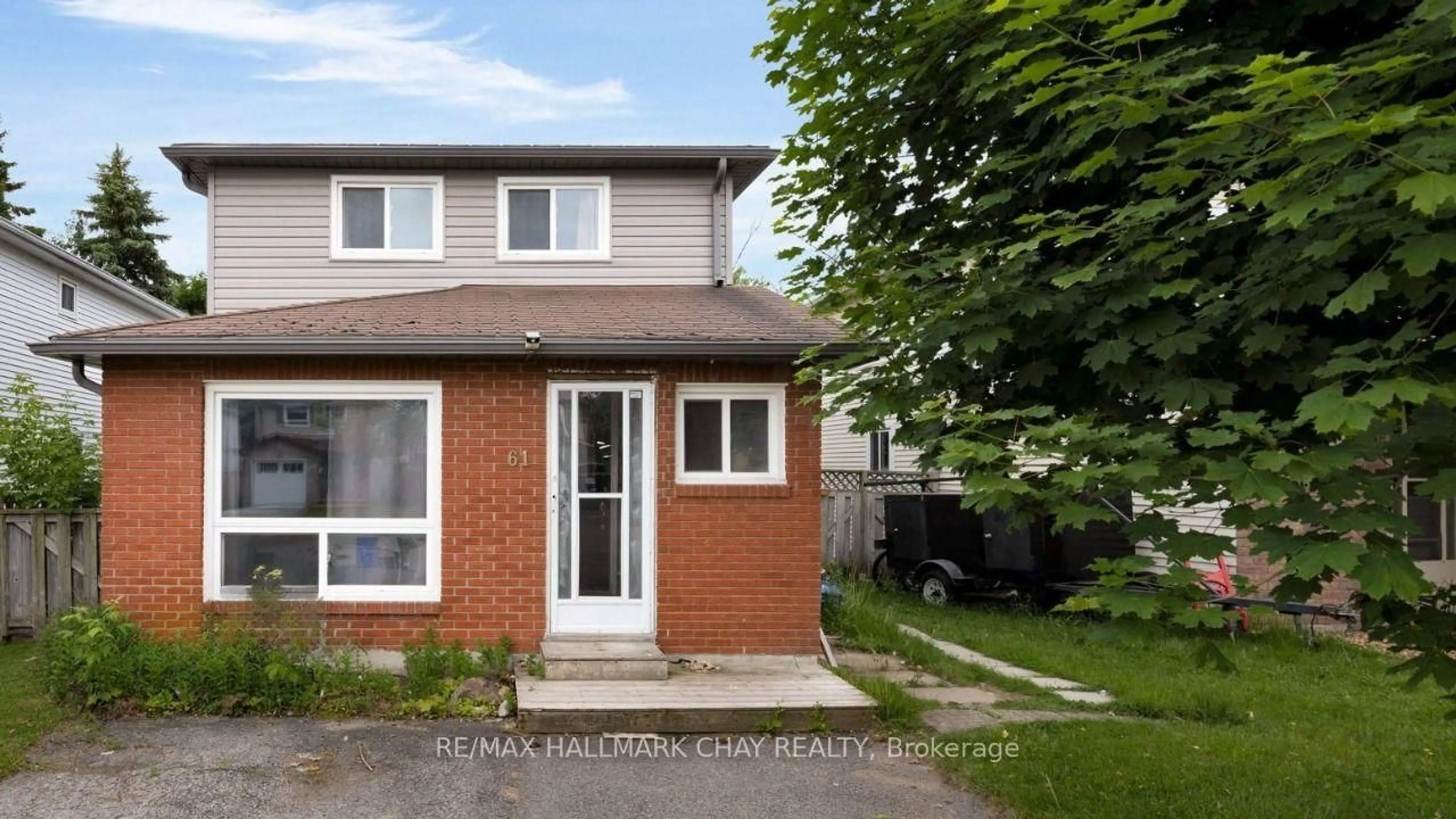 Home with brick exterior material, street for 61 Corbett Dr, Barrie Ontario L4M 5V6
