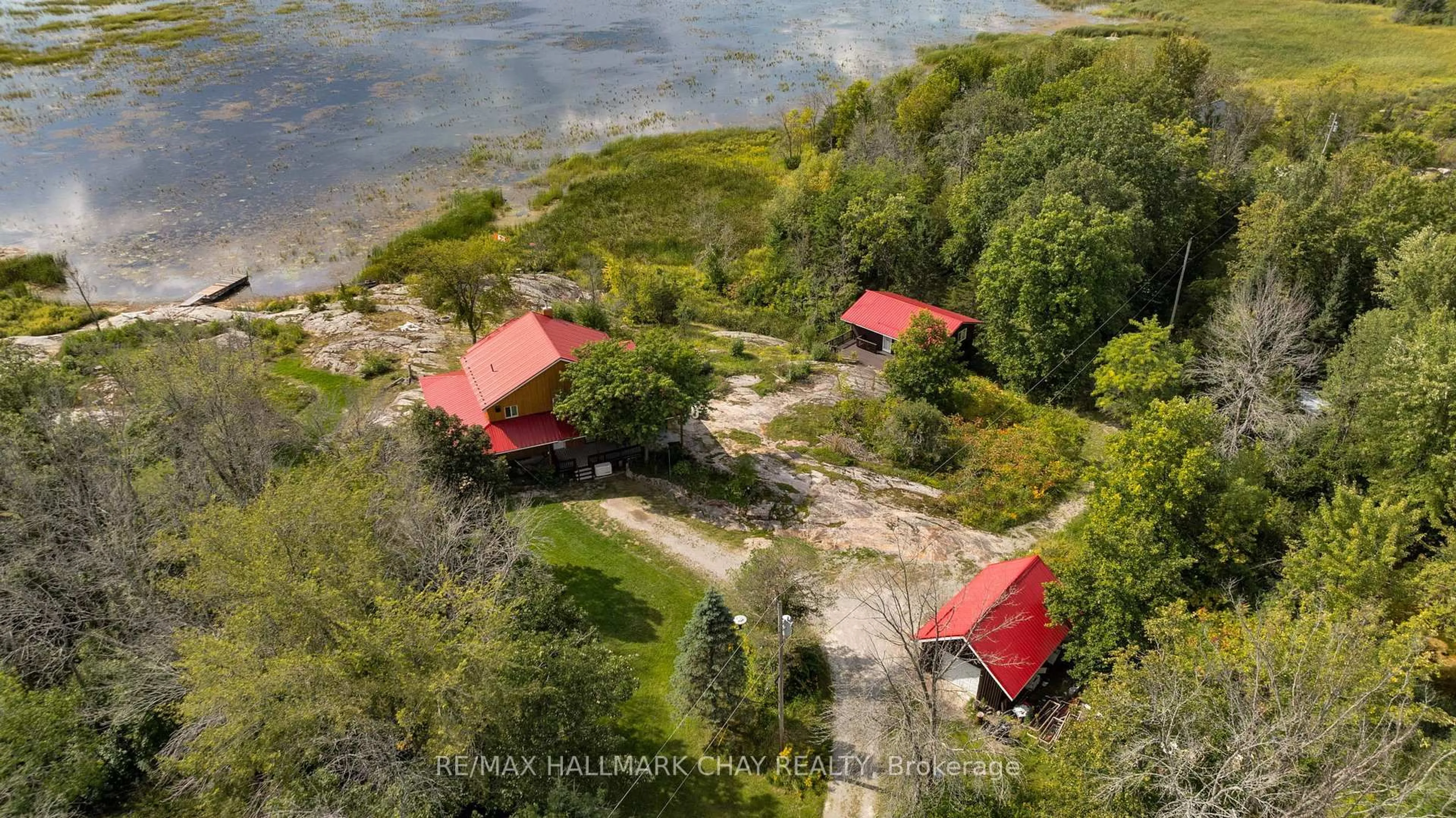 A pic from outside/outdoor area/front of a property/back of a property/a pic from drone, water/lake/river/ocean view for 1866 Tay Bay Rd, Severn Ontario L0K 1E0
