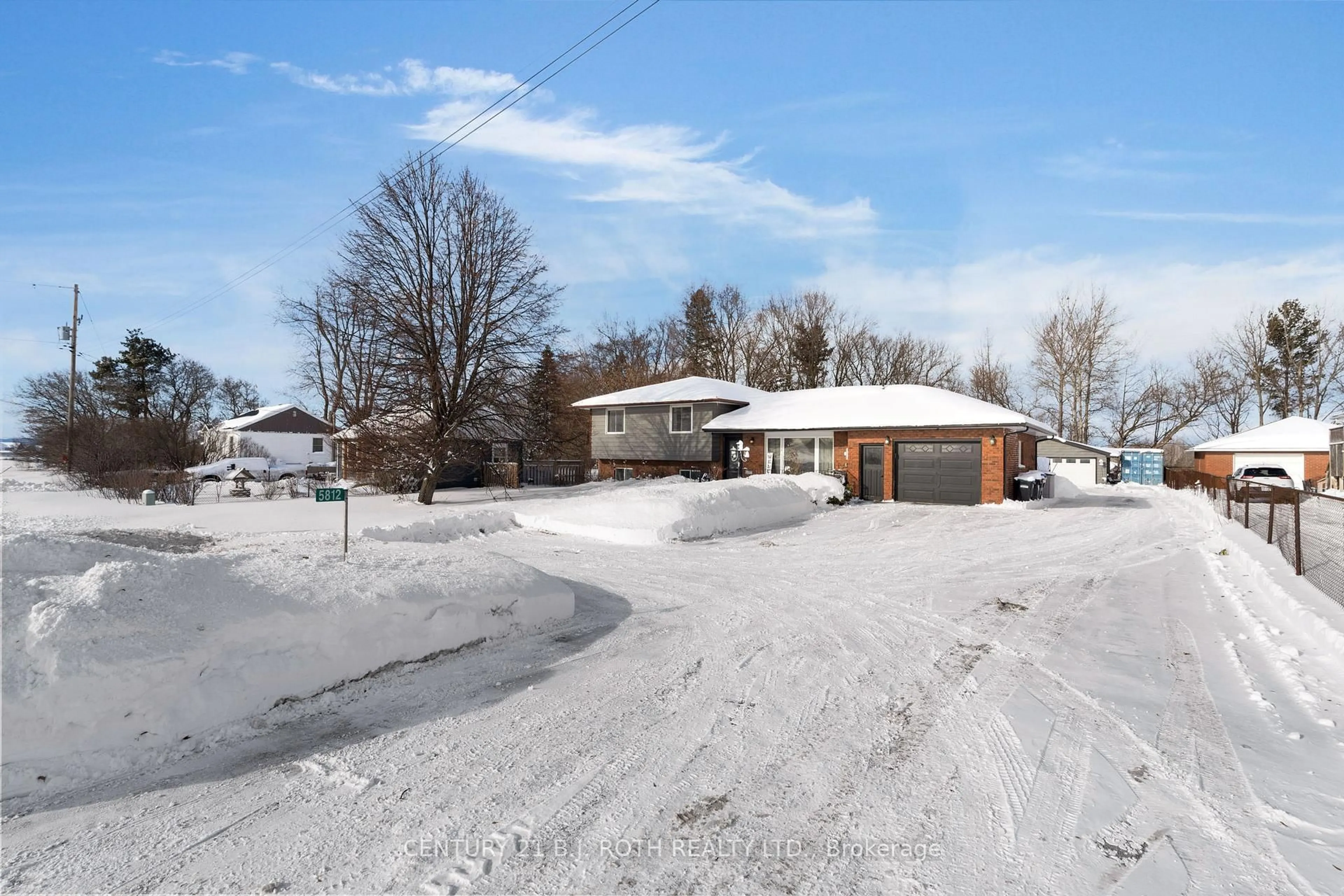 A pic from outside/outdoor area/front of a property/back of a property/a pic from drone, street for 5812 COUNTY RD 90, Springwater Ontario L0M 1T2