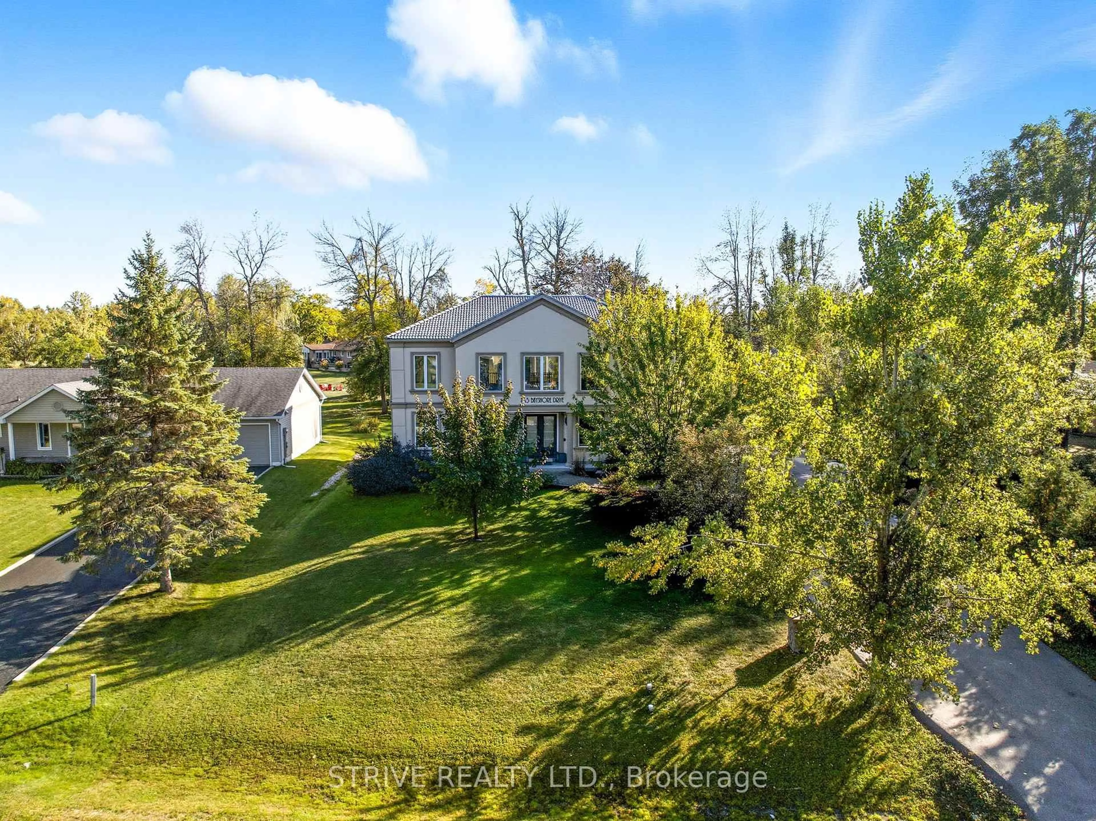 A pic from outside/outdoor area/front of a property/back of a property/a pic from drone, water/lake/river/ocean view for 165 Bayshore Dr, Ramara Ontario L0K 1B0