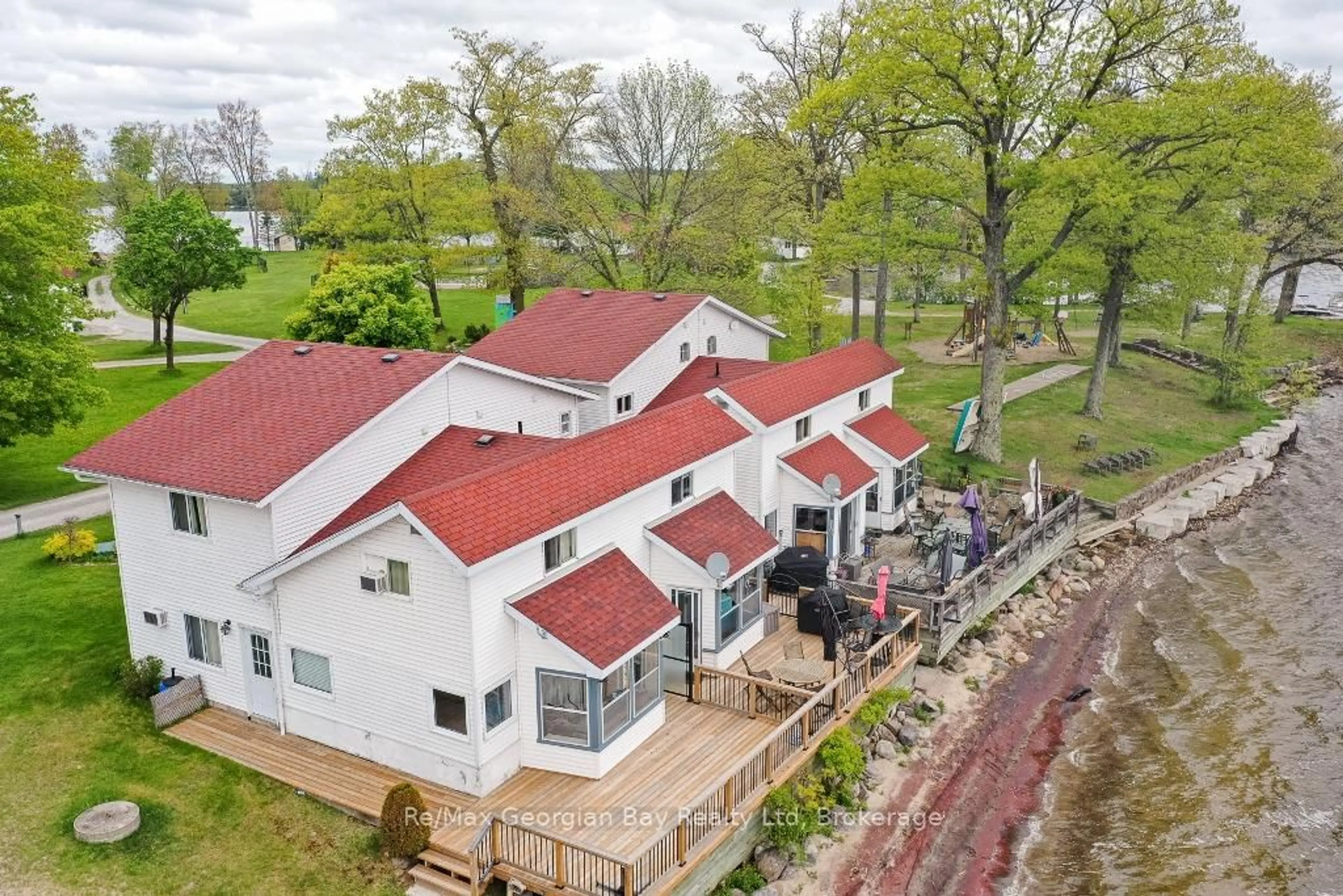 A pic from outside/outdoor area/front of a property/back of a property/a pic from drone, building for 1230 GRANDVIEW LODGE Rd #Beach Chalet #3, Severn Ontario P0E 1N0