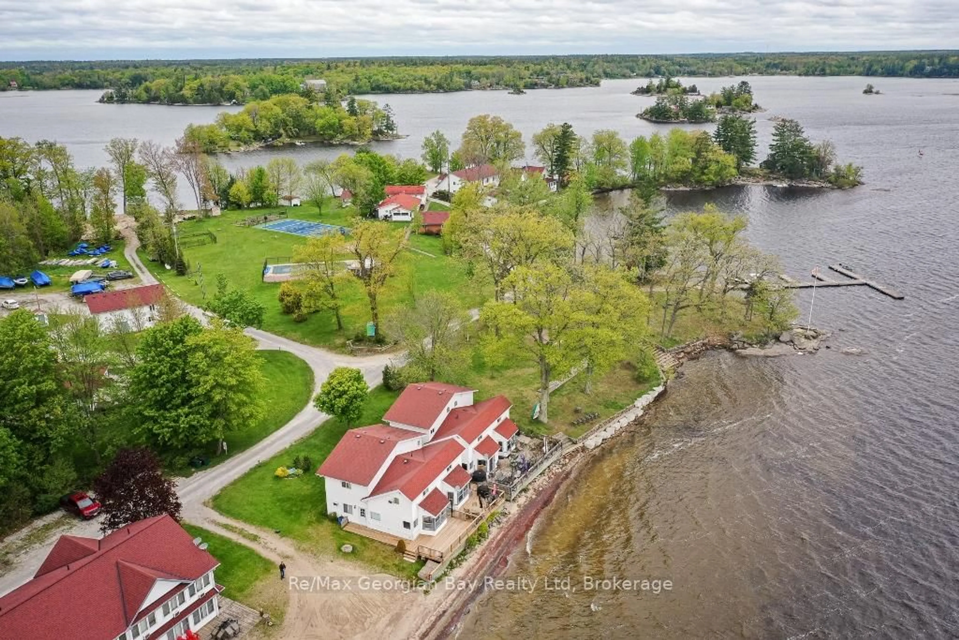 A pic from outside/outdoor area/front of a property/back of a property/a pic from drone, water/lake/river/ocean view for 1230 GRANDVIEW LODGE Rd #Beach Chalet #3, Severn Ontario P0E 1N0