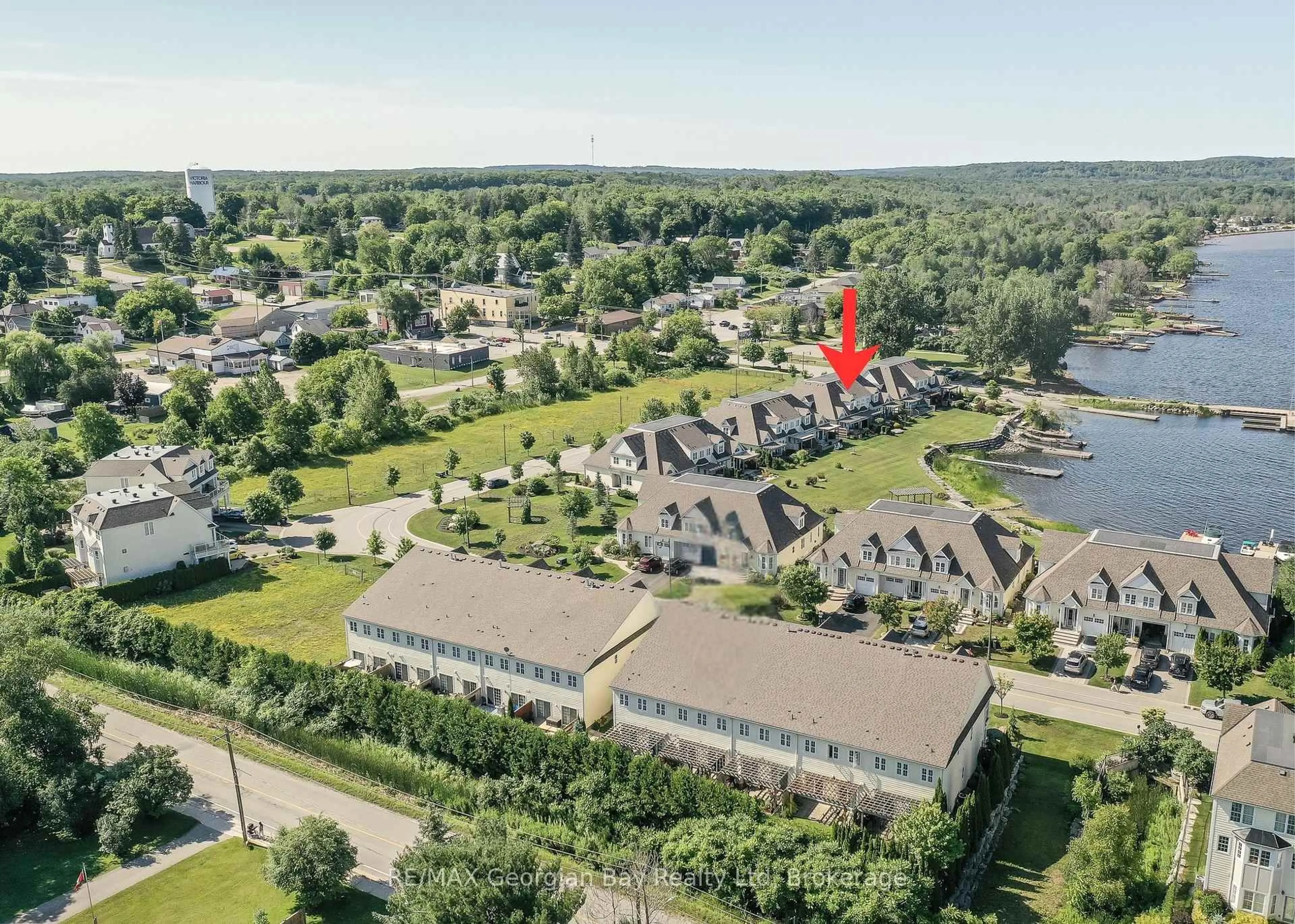 A pic from outside/outdoor area/front of a property/back of a property/a pic from drone, water/lake/river/ocean view for 210 Wycliffe Cove, Tay Ontario L0K 2A0
