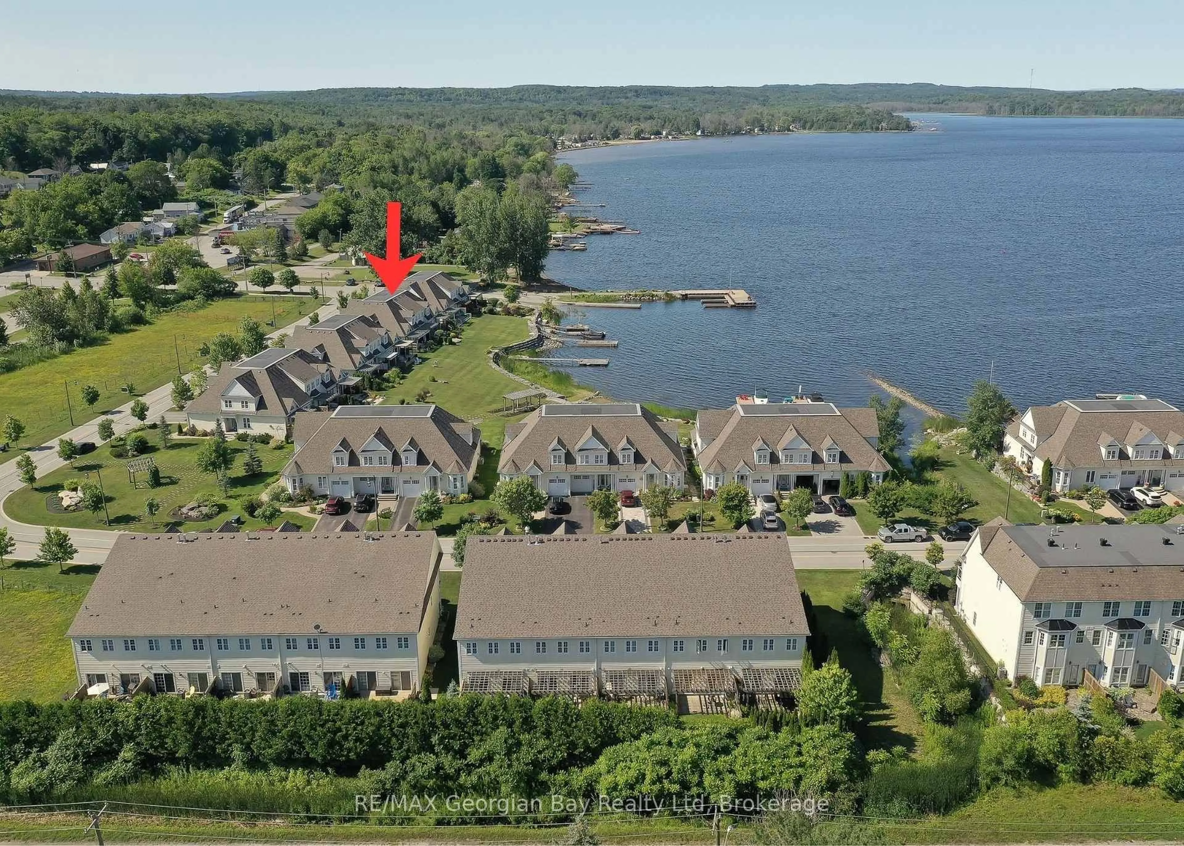 A pic from outside/outdoor area/front of a property/back of a property/a pic from drone, water/lake/river/ocean view for 210 Wycliffe Cove, Tay Ontario L0K 2A0