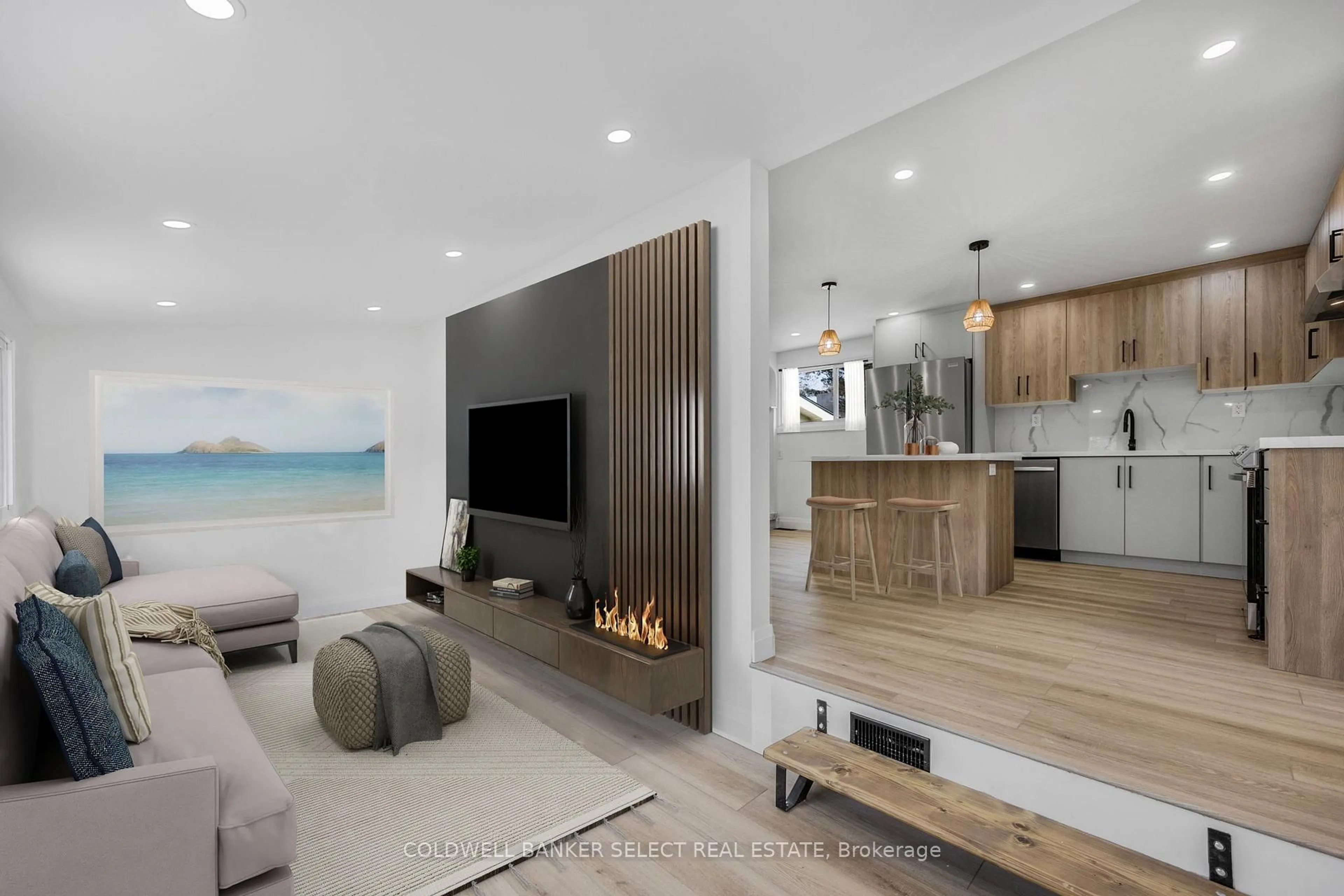 Living room with furniture, wood/laminate floor for 338 Old Mosley St, Wasaga Beach Ontario L9Z 2H6