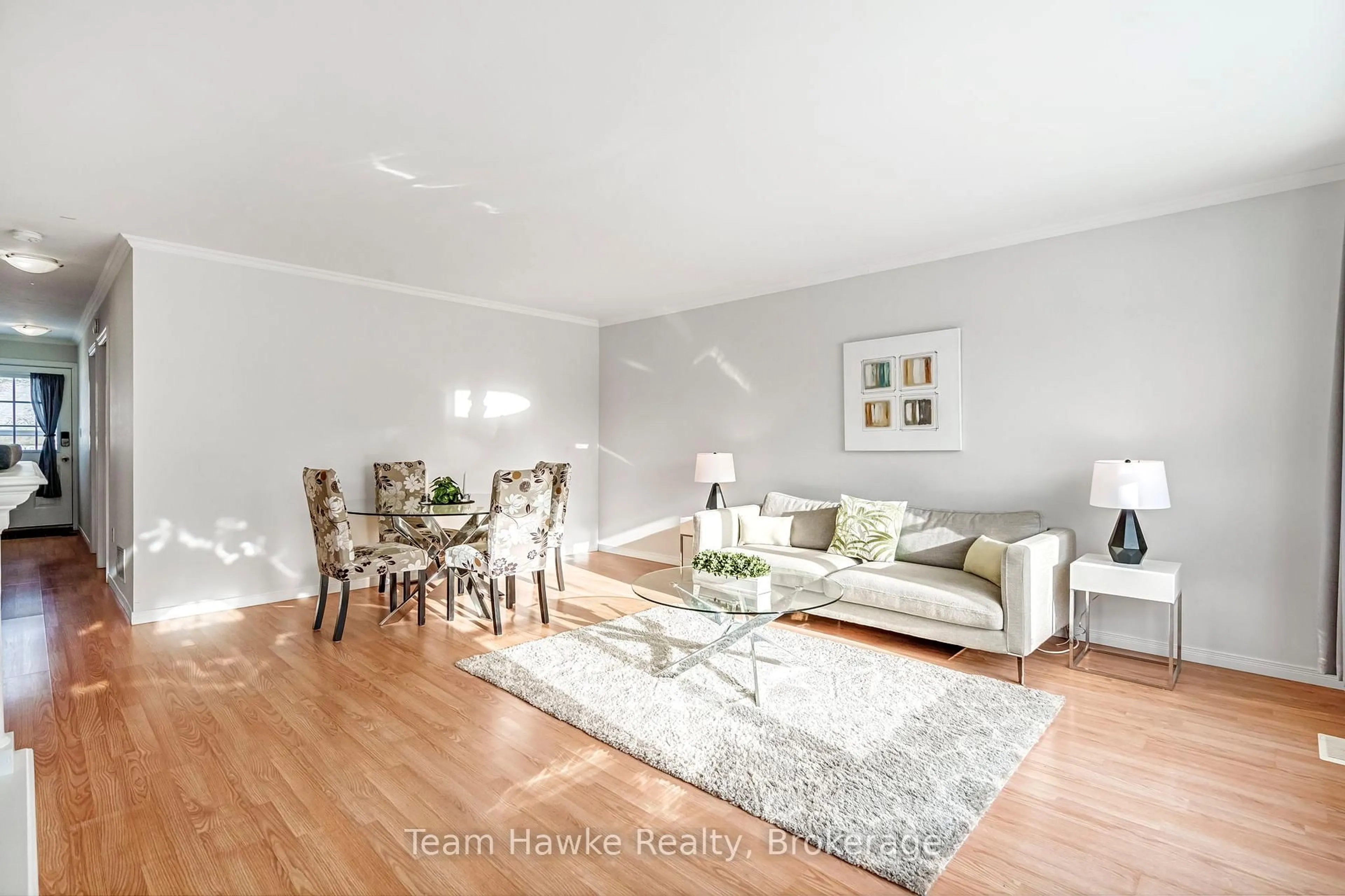 Living room with furniture, wood/laminate floor for 264 Kingfisher Ave, Tay Ontario L0K 1R0