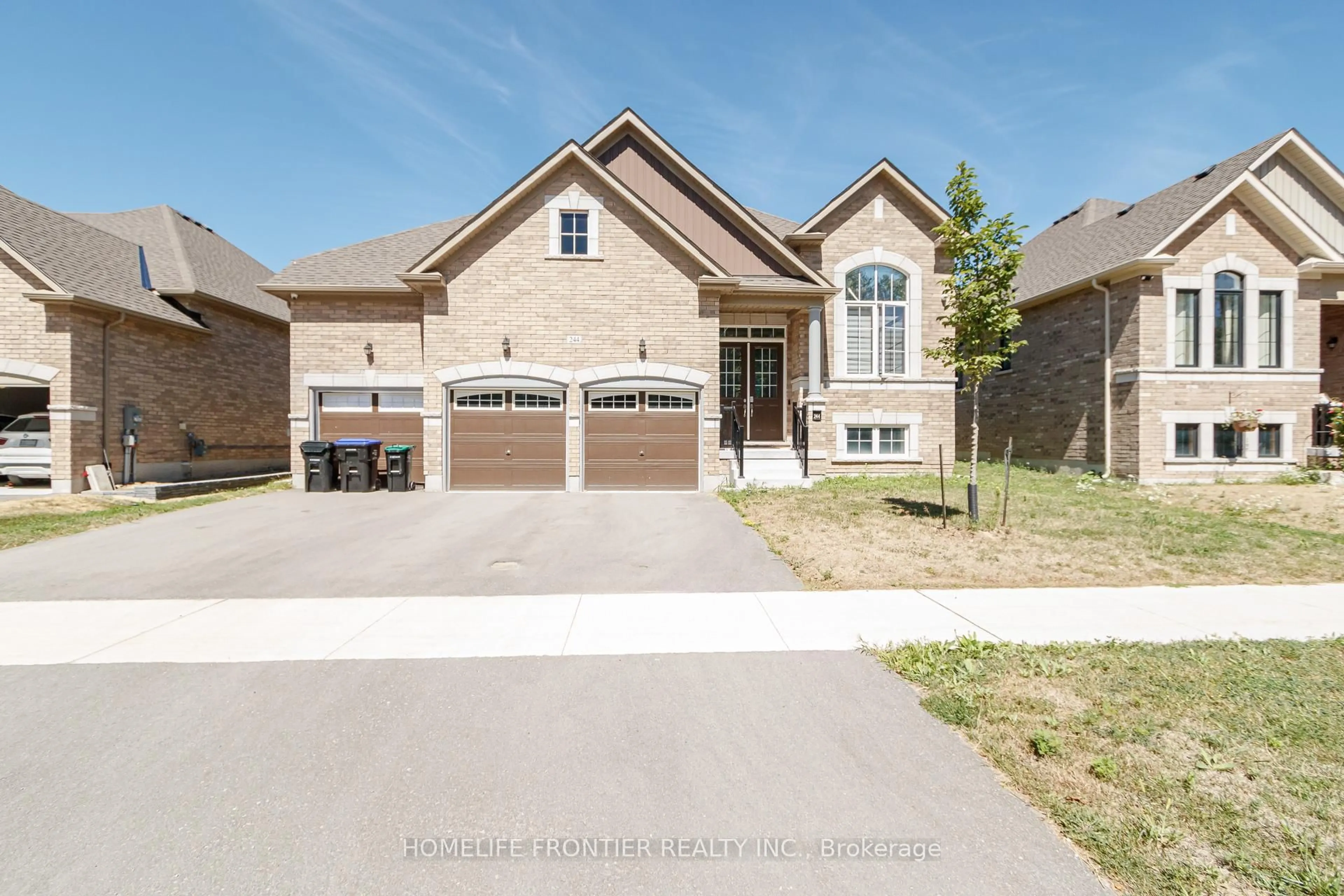 Home with brick exterior material, street for 244 Ramblewood Dr, Wasaga Beach Ontario L9Z 0L5