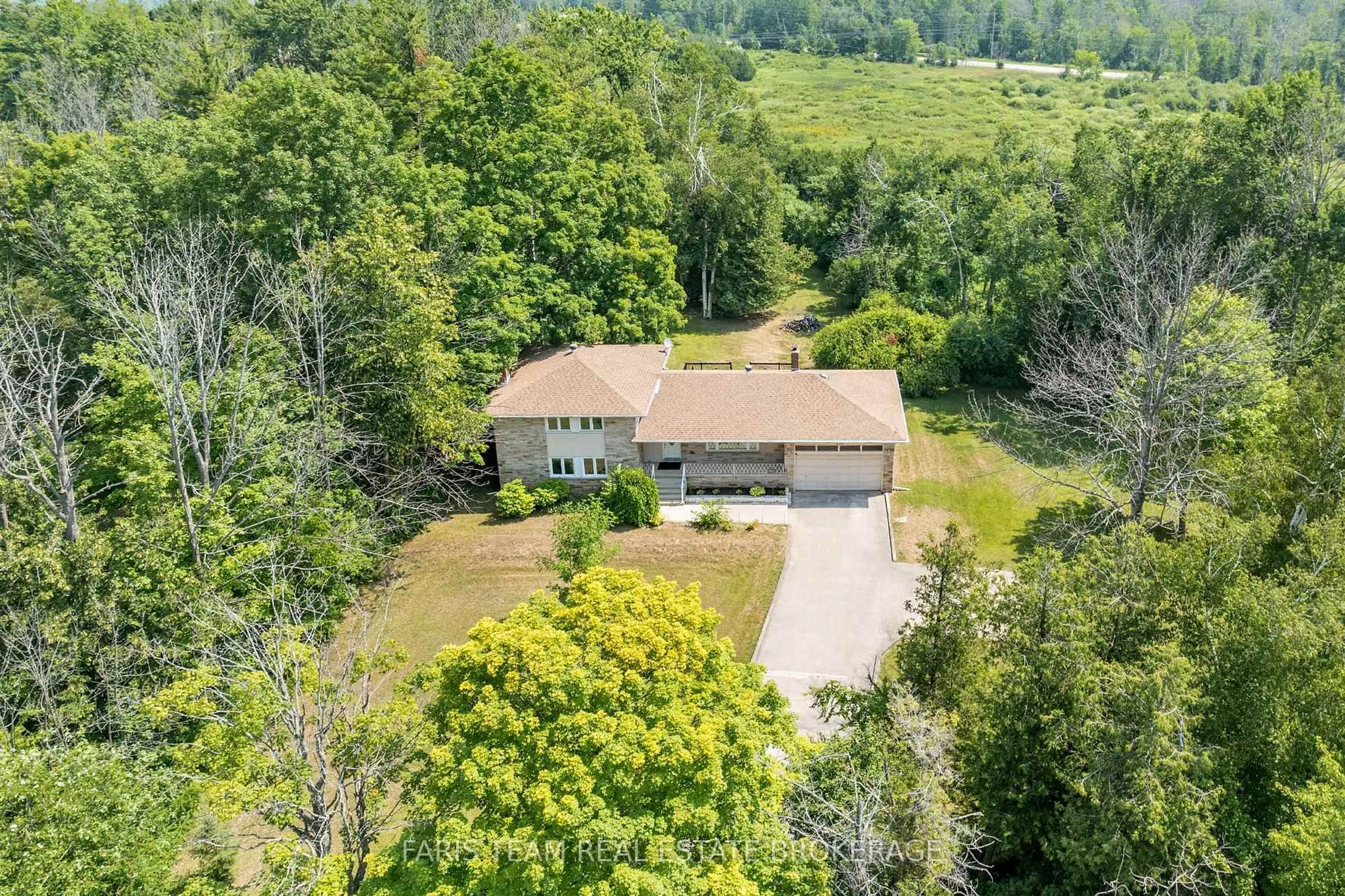 A pic from outside/outdoor area/front of a property/back of a property/a pic from drone, water/lake/river/ocean view for 2597 George Johnston Rd, Springwater Ontario L9X 1C7