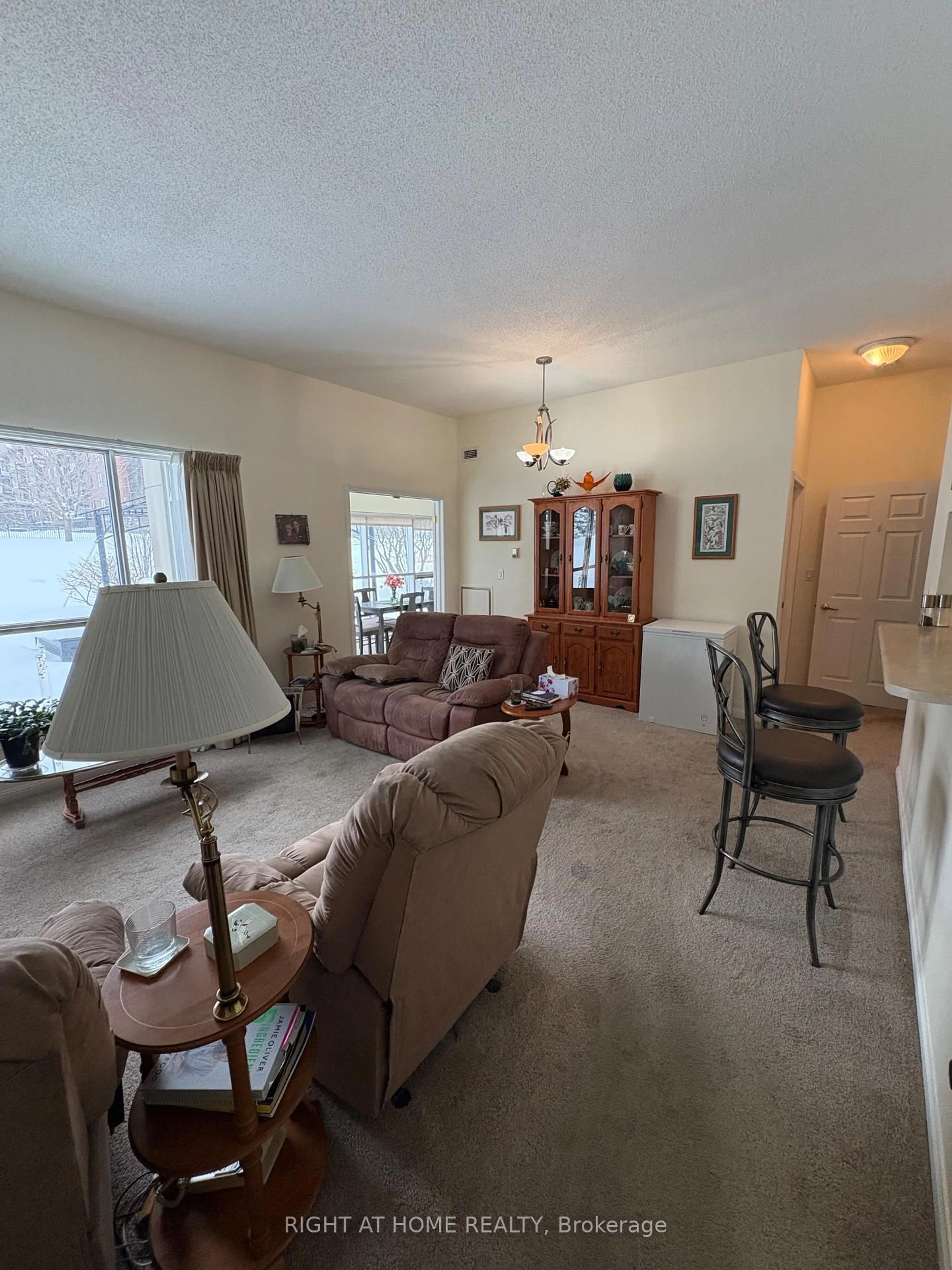 Living room with furniture, floor is not visible for 94 Dean Ave #109, Barrie Ontario L4N 0M3
