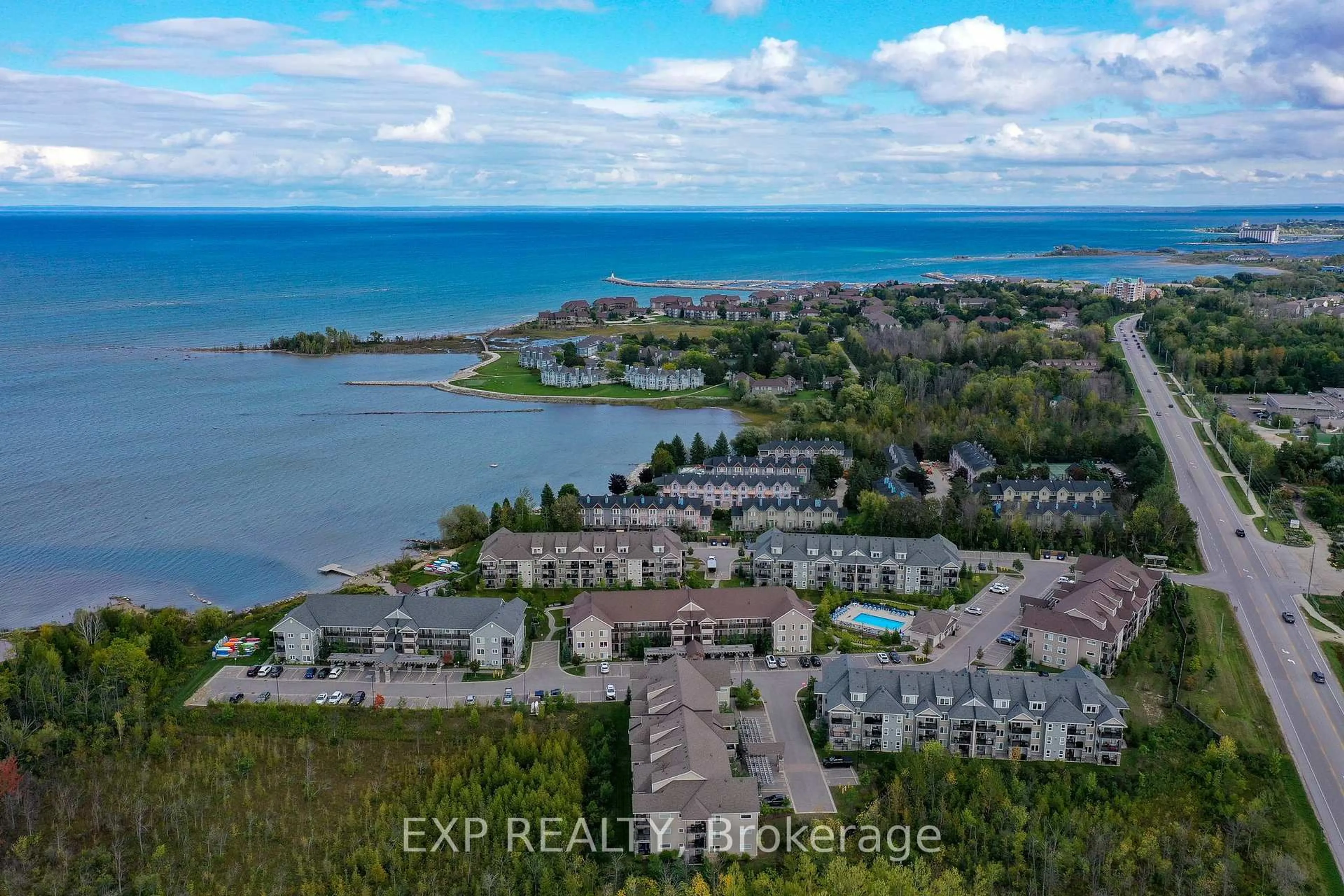 A pic from outside/outdoor area/front of a property/back of a property/a pic from drone, water/lake/river/ocean view for 5 Anchorage Cres #202, Collingwood Ontario L9Y 0Y6